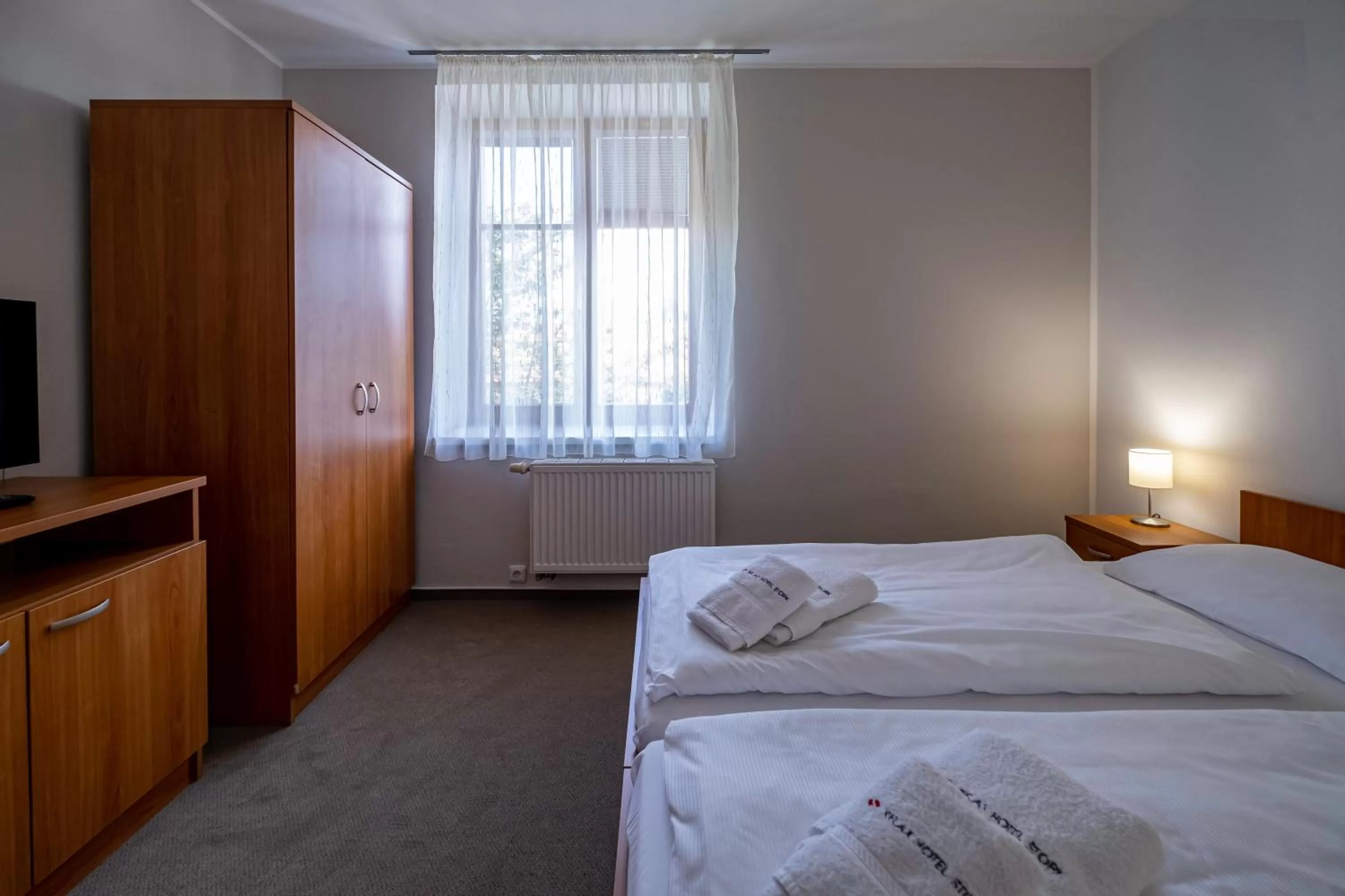 Bed in Relax Hotel Stork