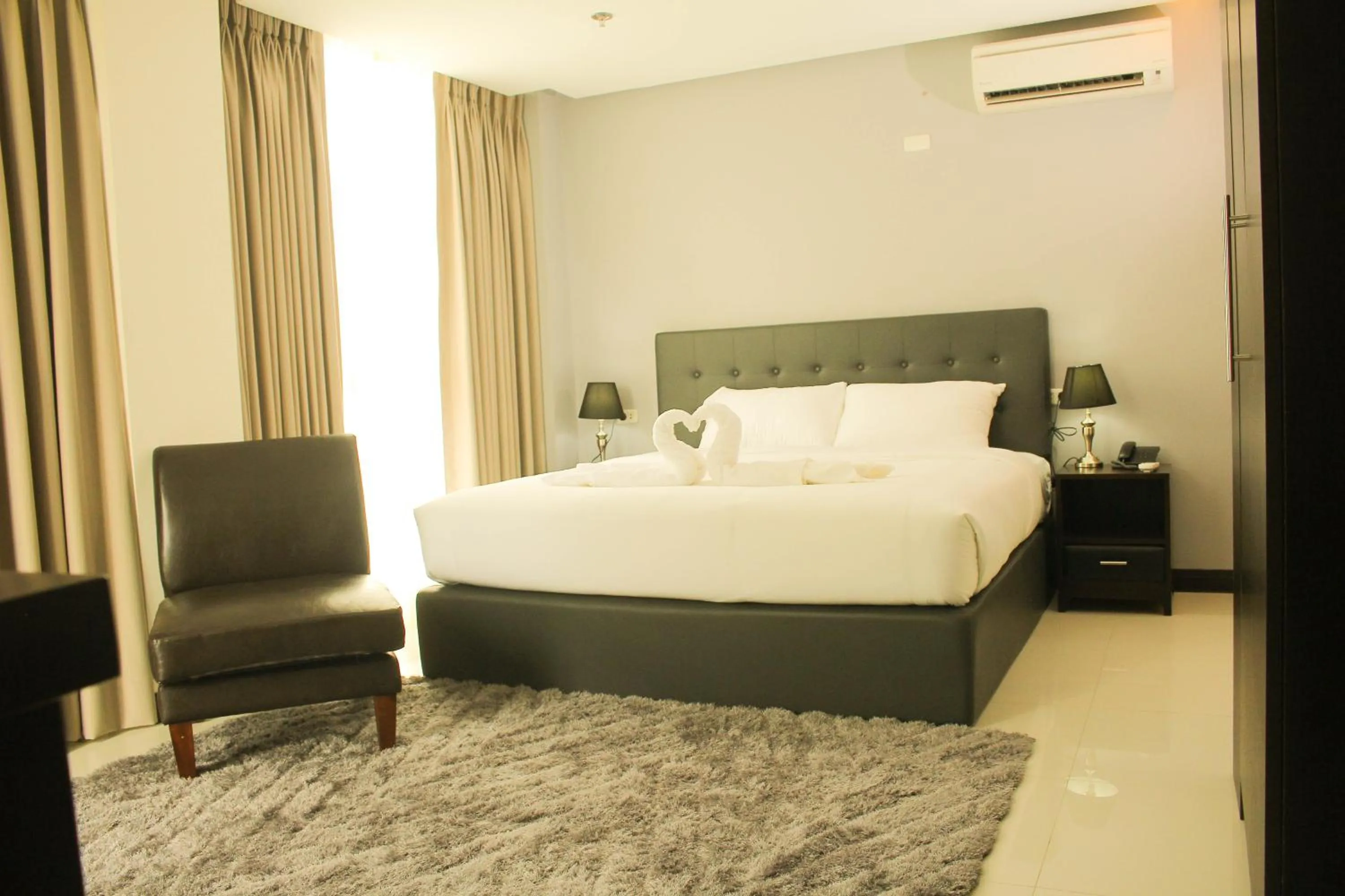 Bed in The Pacifico Boutique Hotel