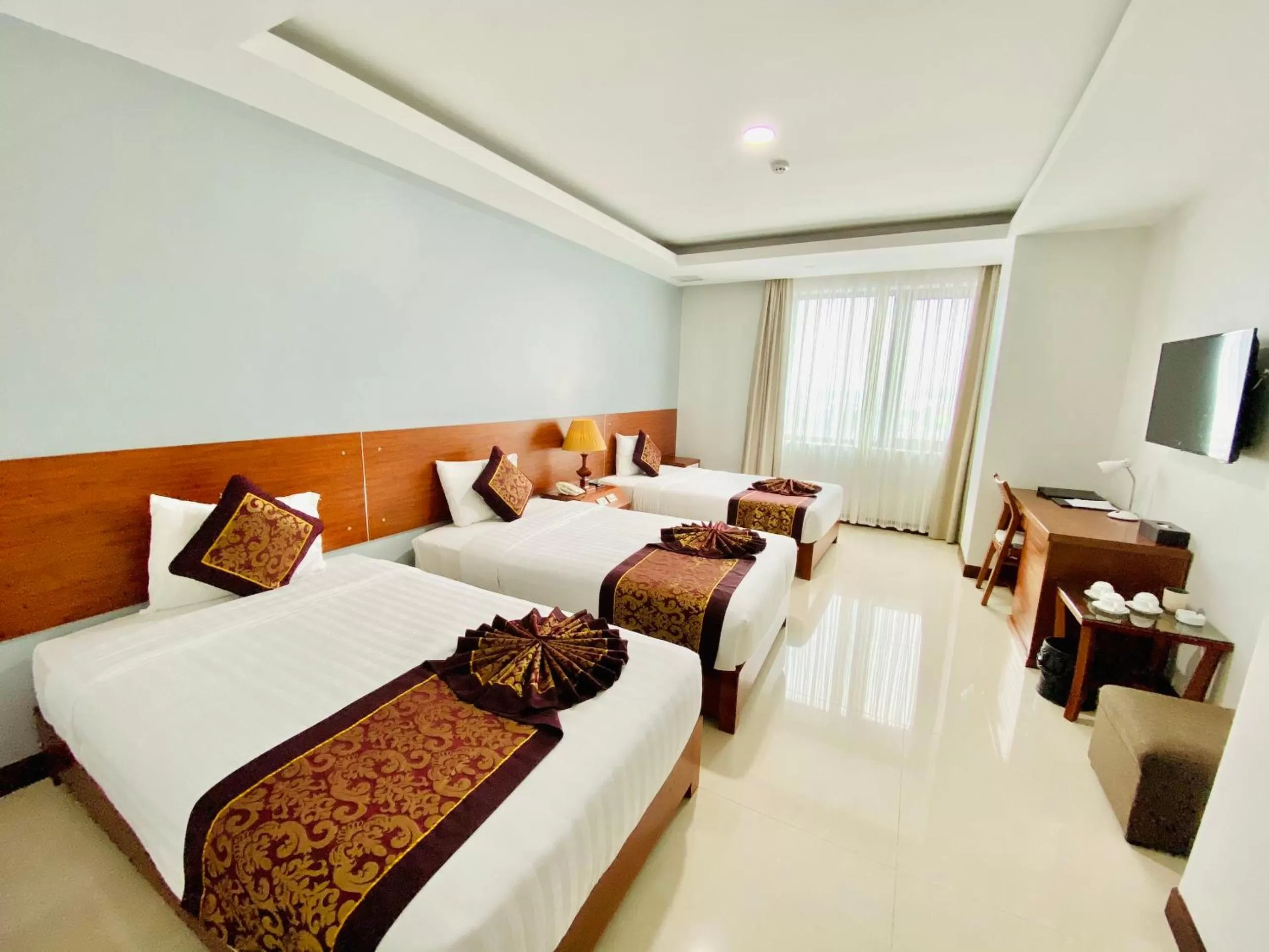 Bed in Kim Thai Hotel