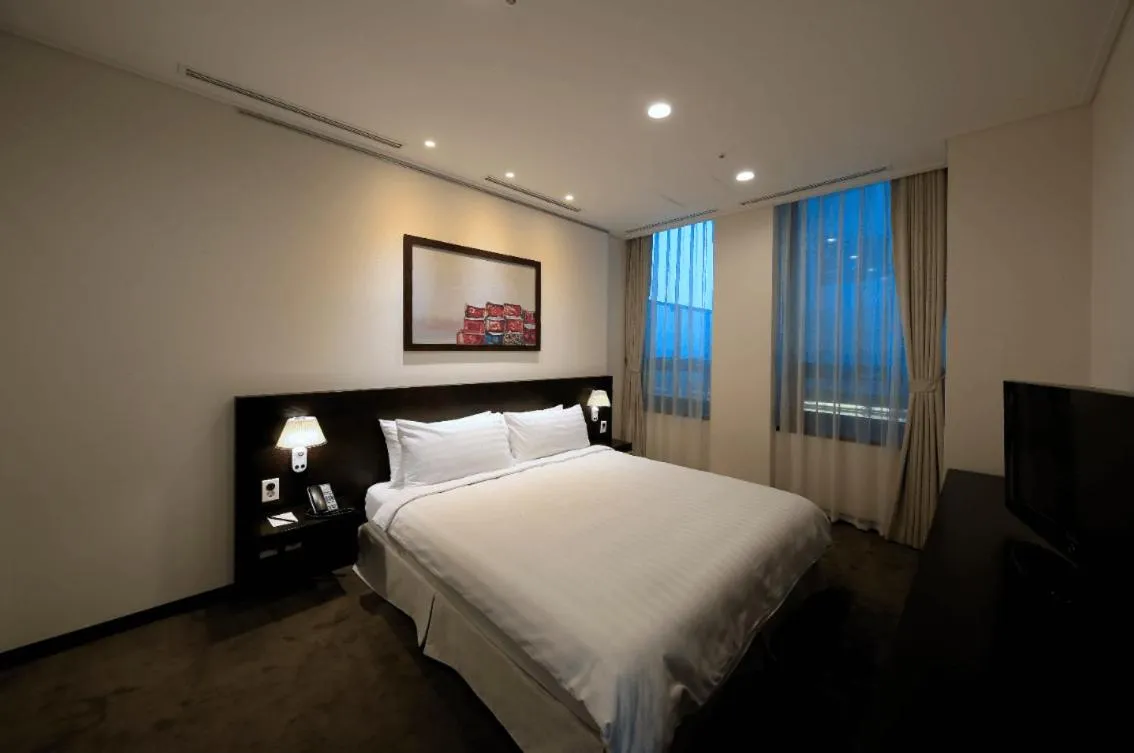 Bed in Orakai Insadong Suites