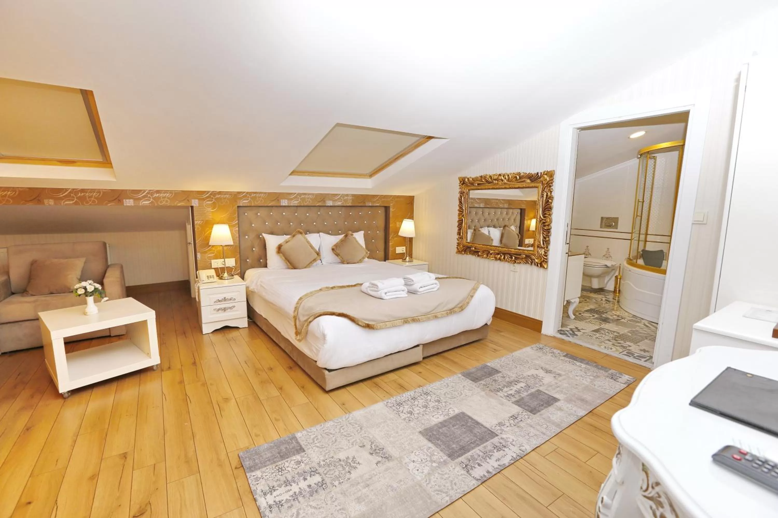 Bed in Diamond Royal Hotel