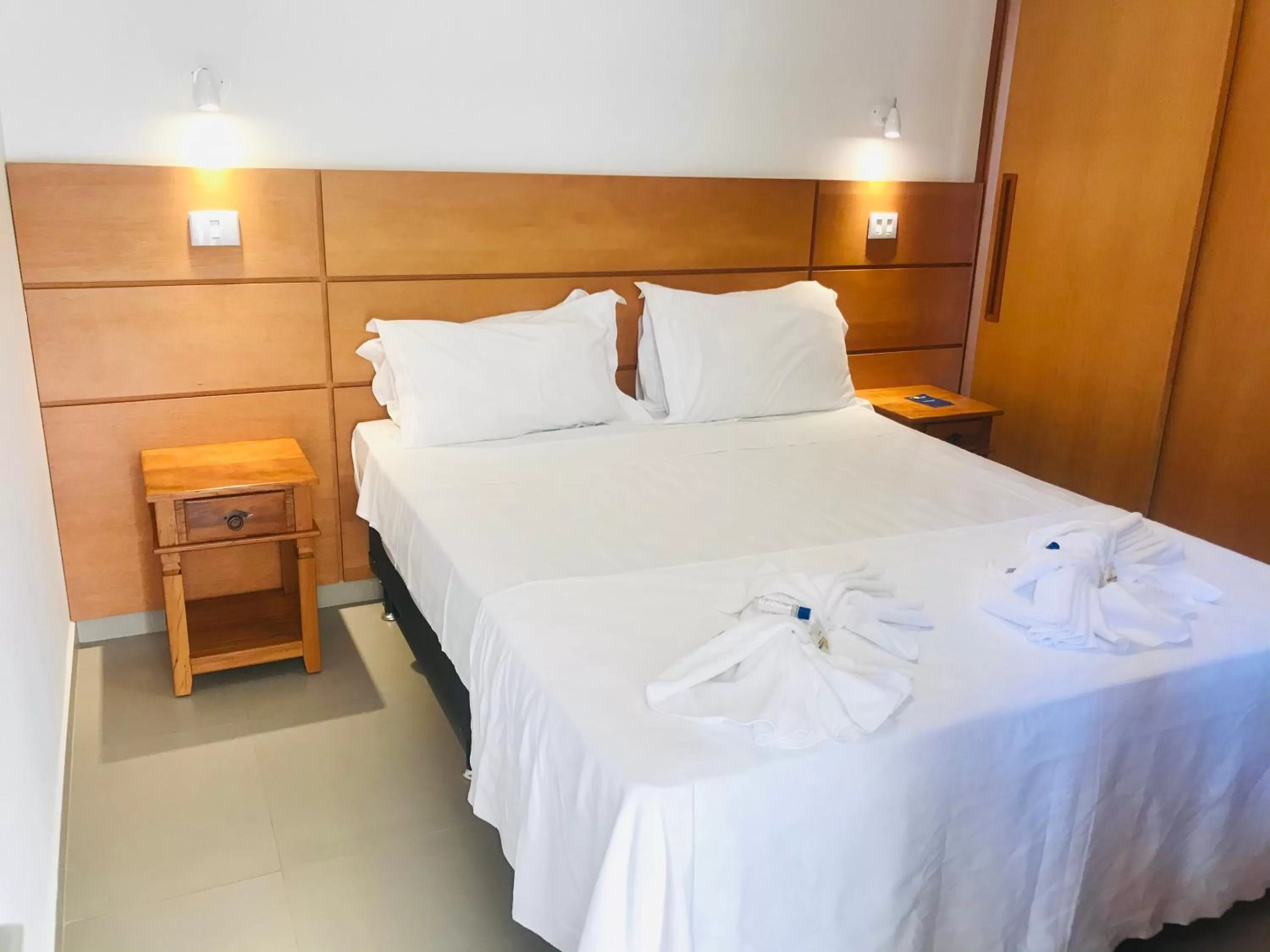 Bed in Pousada Ilha Vitoria