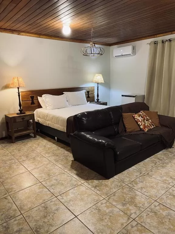 Bed in POUSADA CHARLOTTE