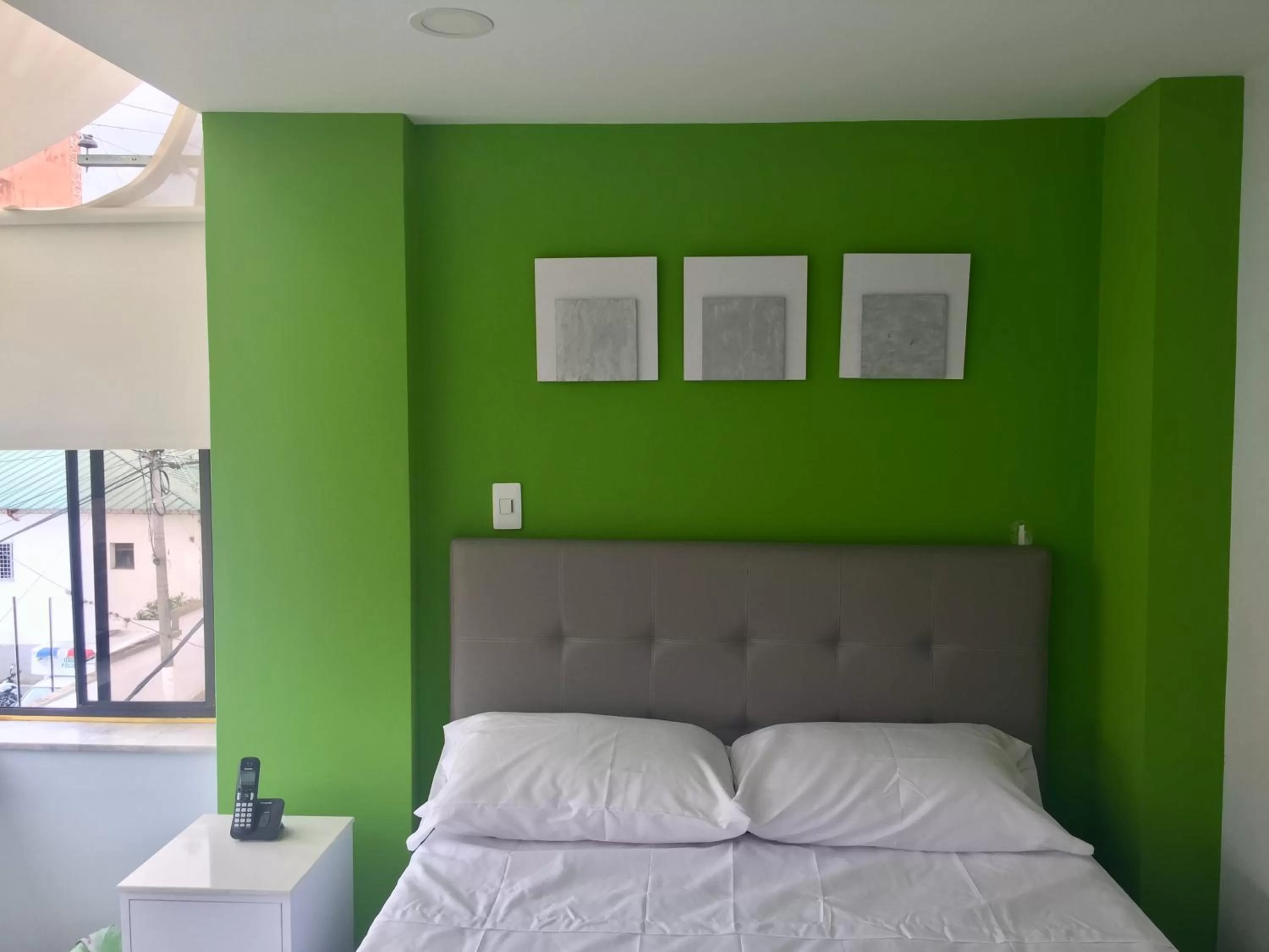 Bed in Hotel Garden City Boutique