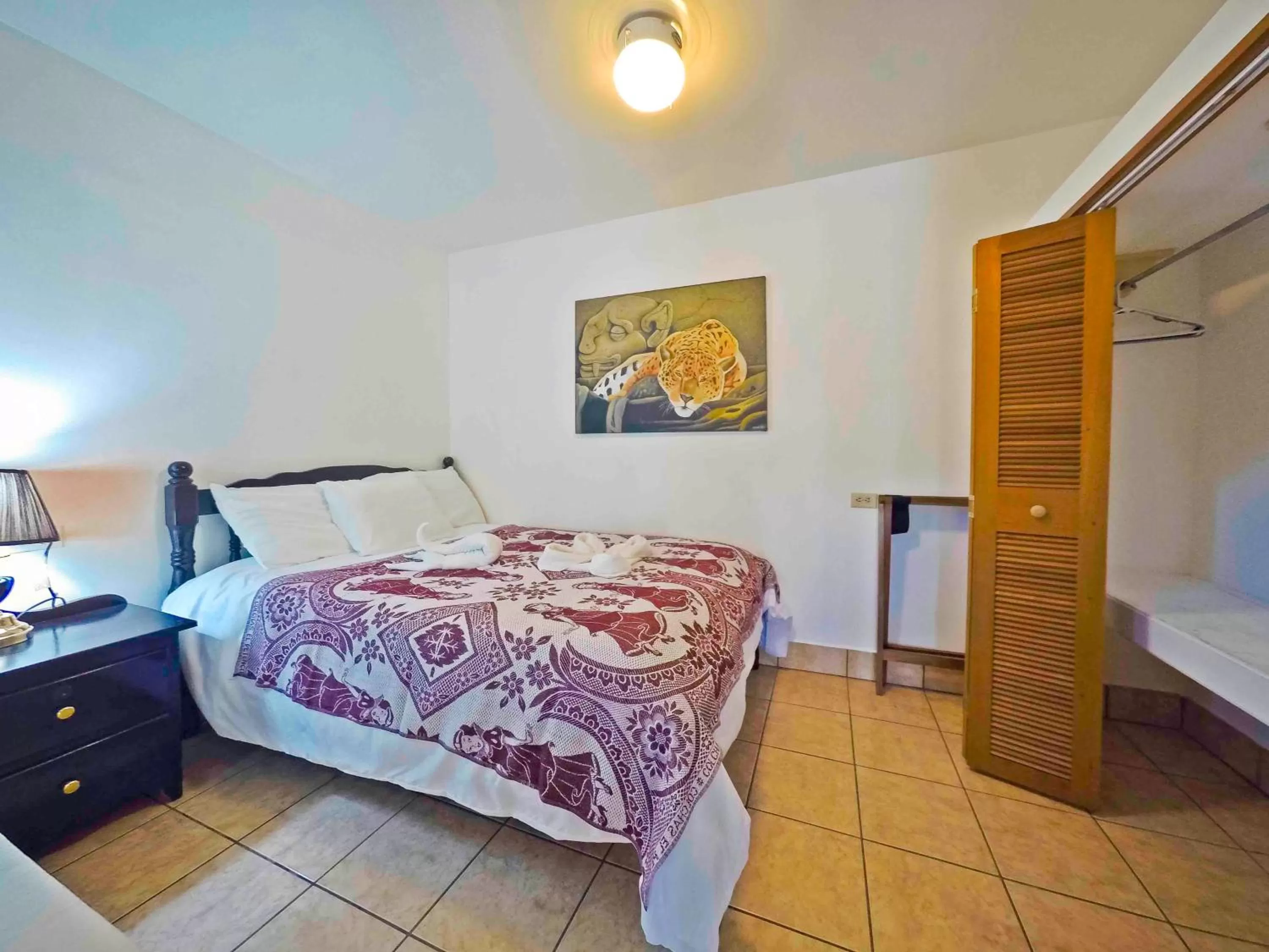 Bed in Rumors Resort Hotel