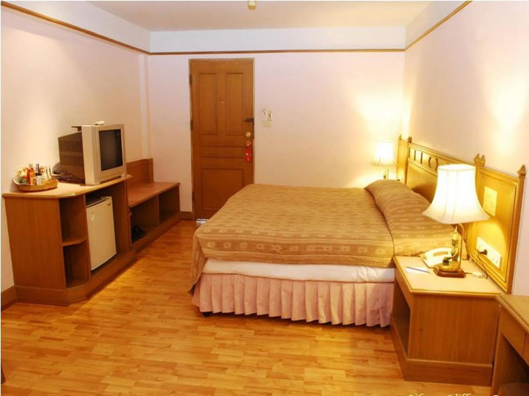 Bed in Silom Village Inn