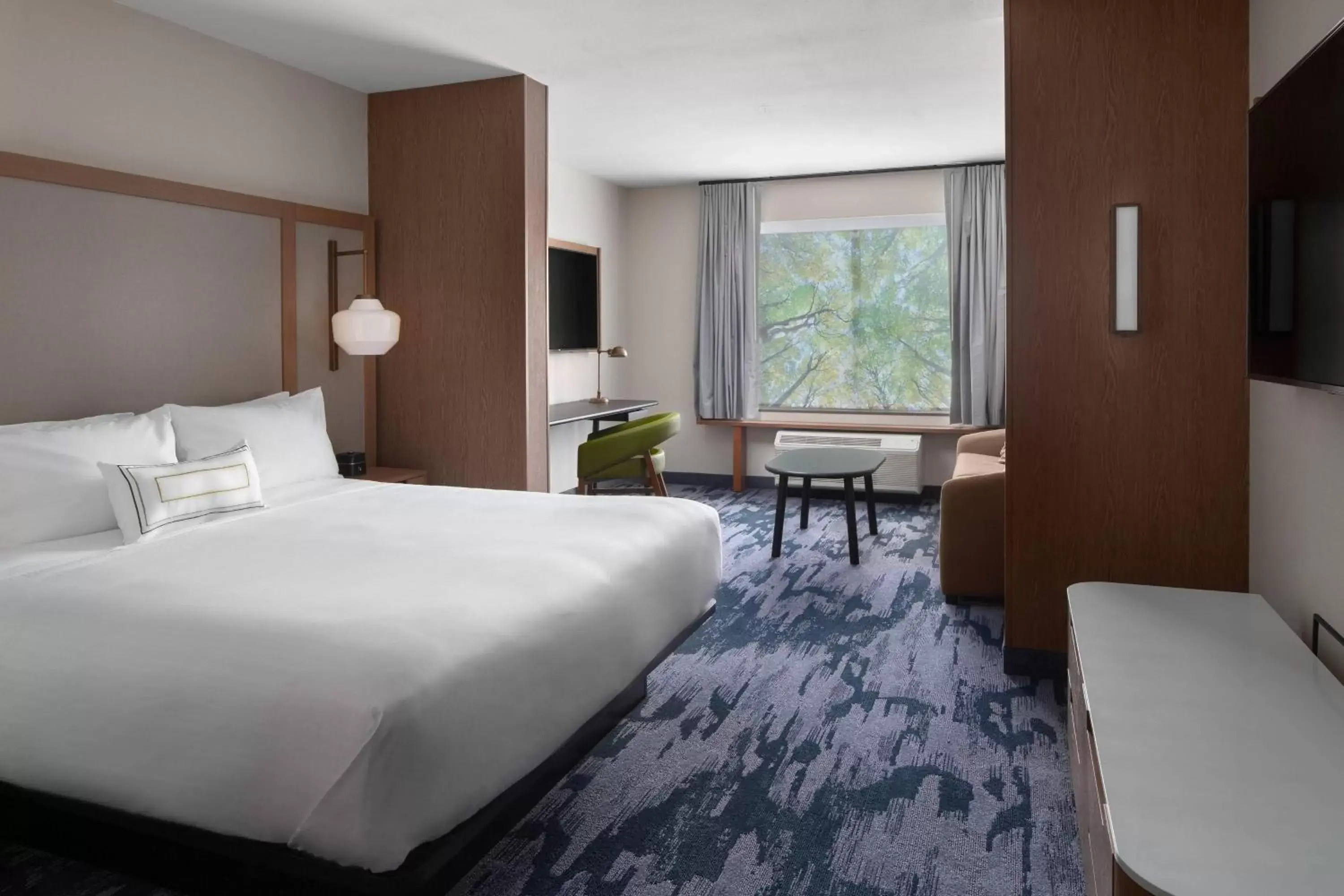 Guest Room with King Bed and a Sofa in Fairfield Inn & Suites by Marriott Kenosha Pleasant Prairie Guest Room with King Bed and a Sofa in Fairfield Inn & Suites by Marriott Kenosha Pleasant Prairie