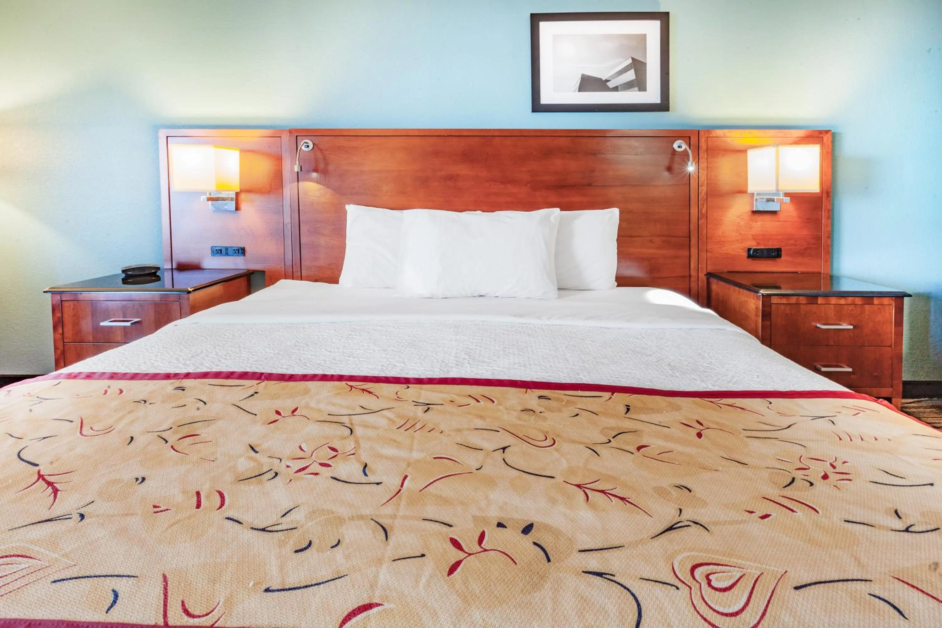 Bed in Days Inn & Suites by Wyndham St. Ignace Lakefront