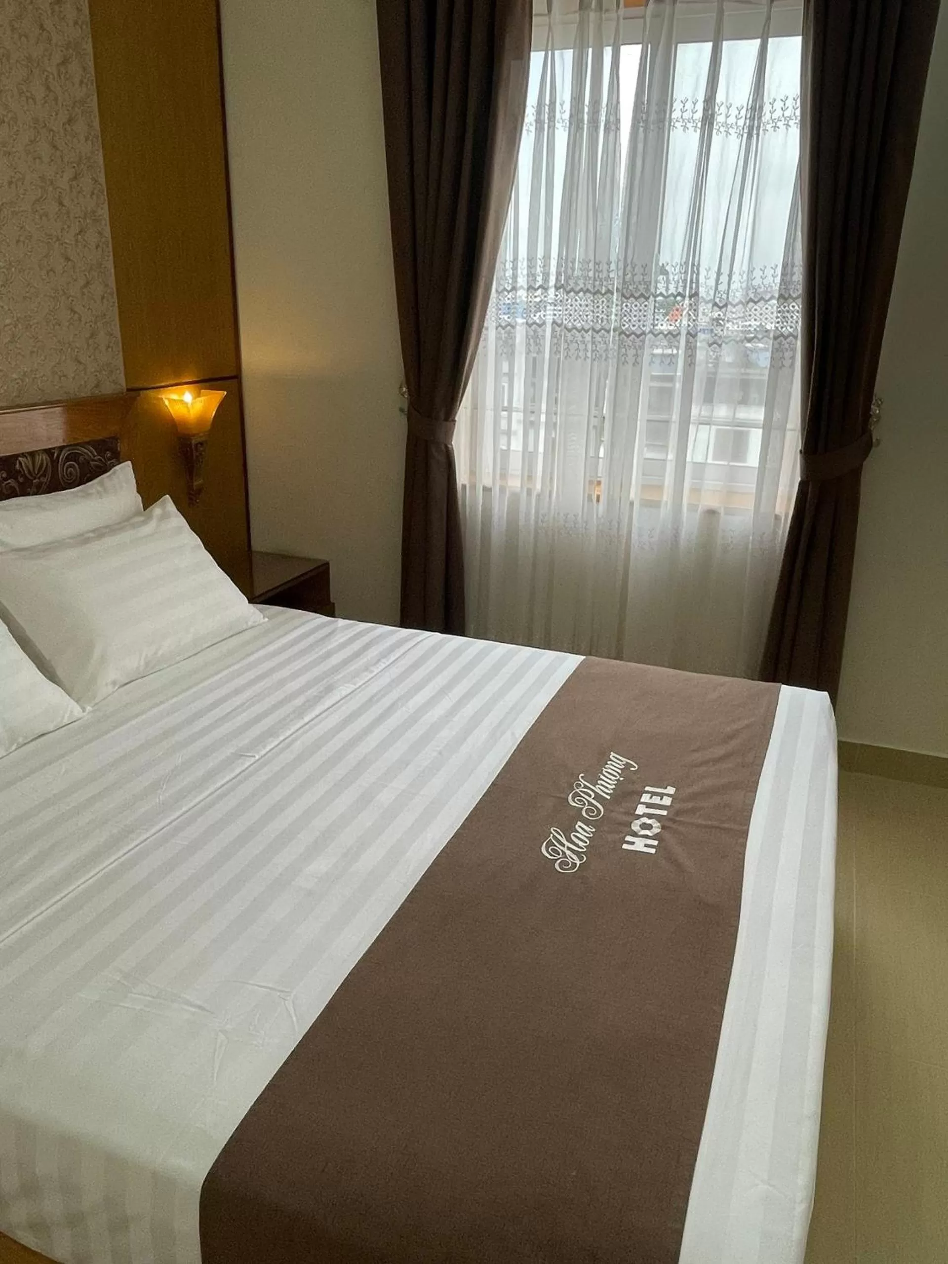 Bed in Hoa Phuong Hotel