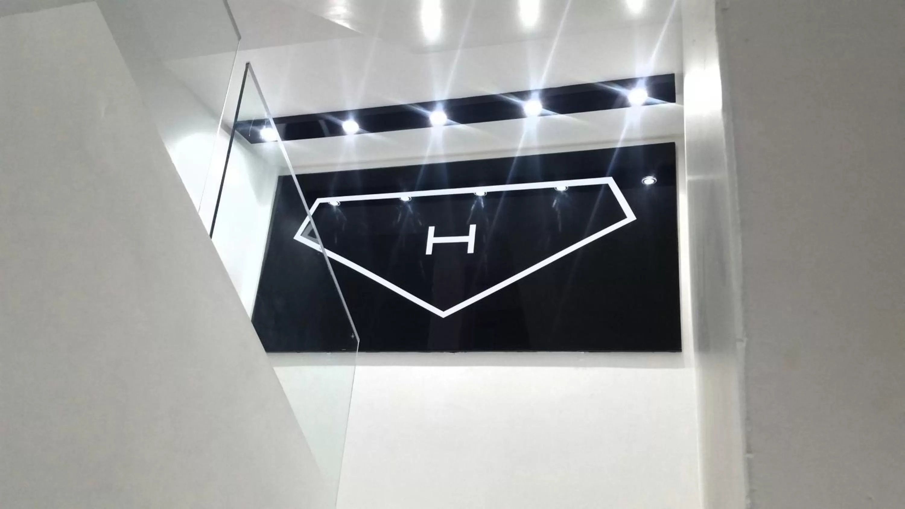 Property logo or sign, Bathroom in Hotel Hulk