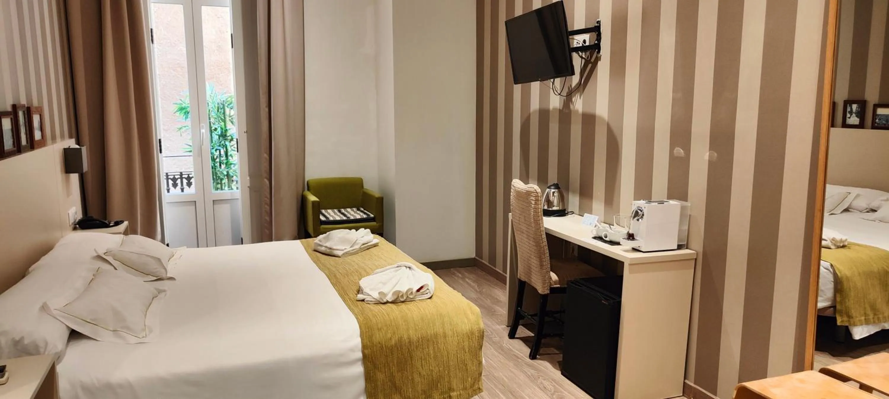 Bed in Hotel San Lorenzo Boutique Plaza