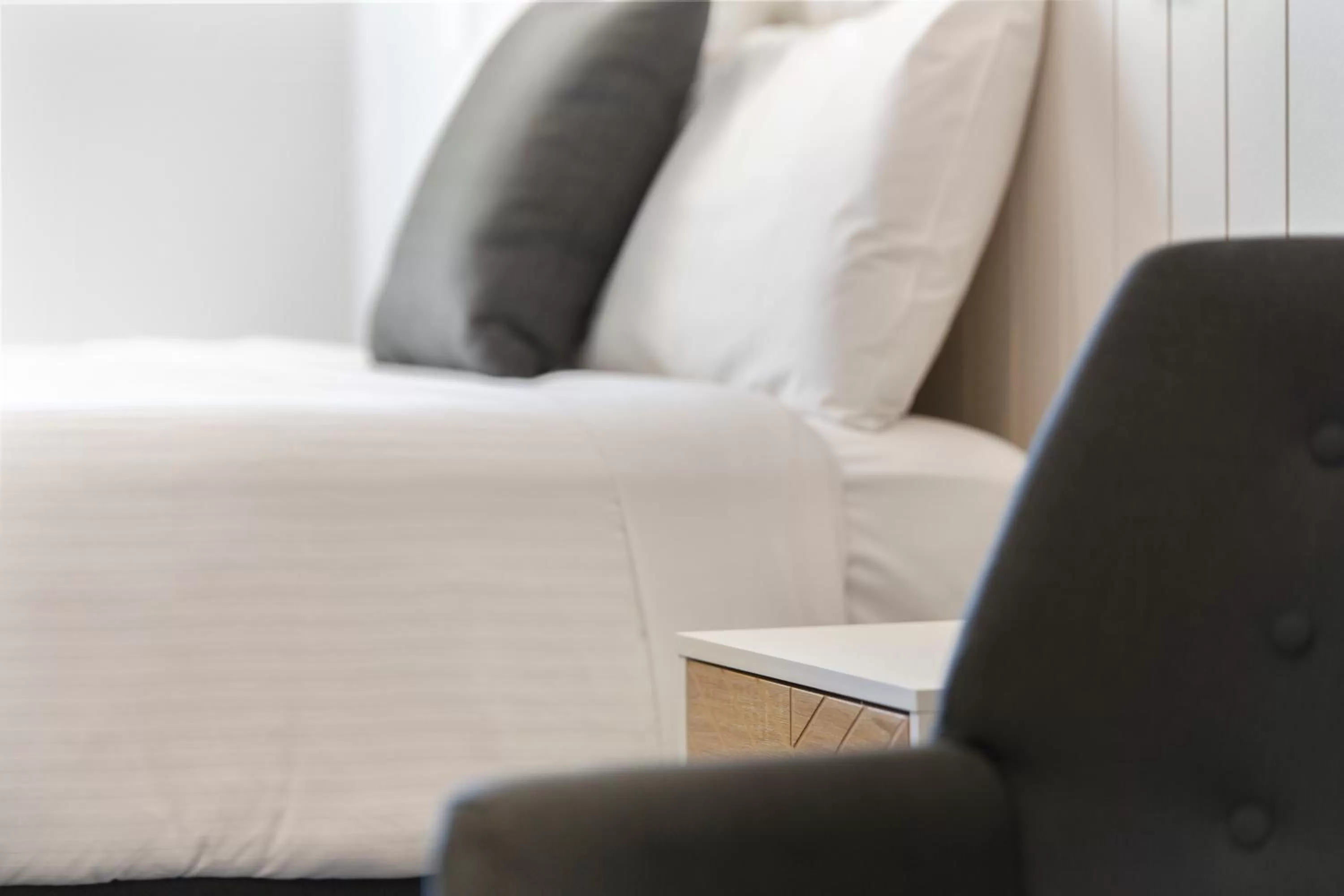 Bed in The Wine Vine Hotel