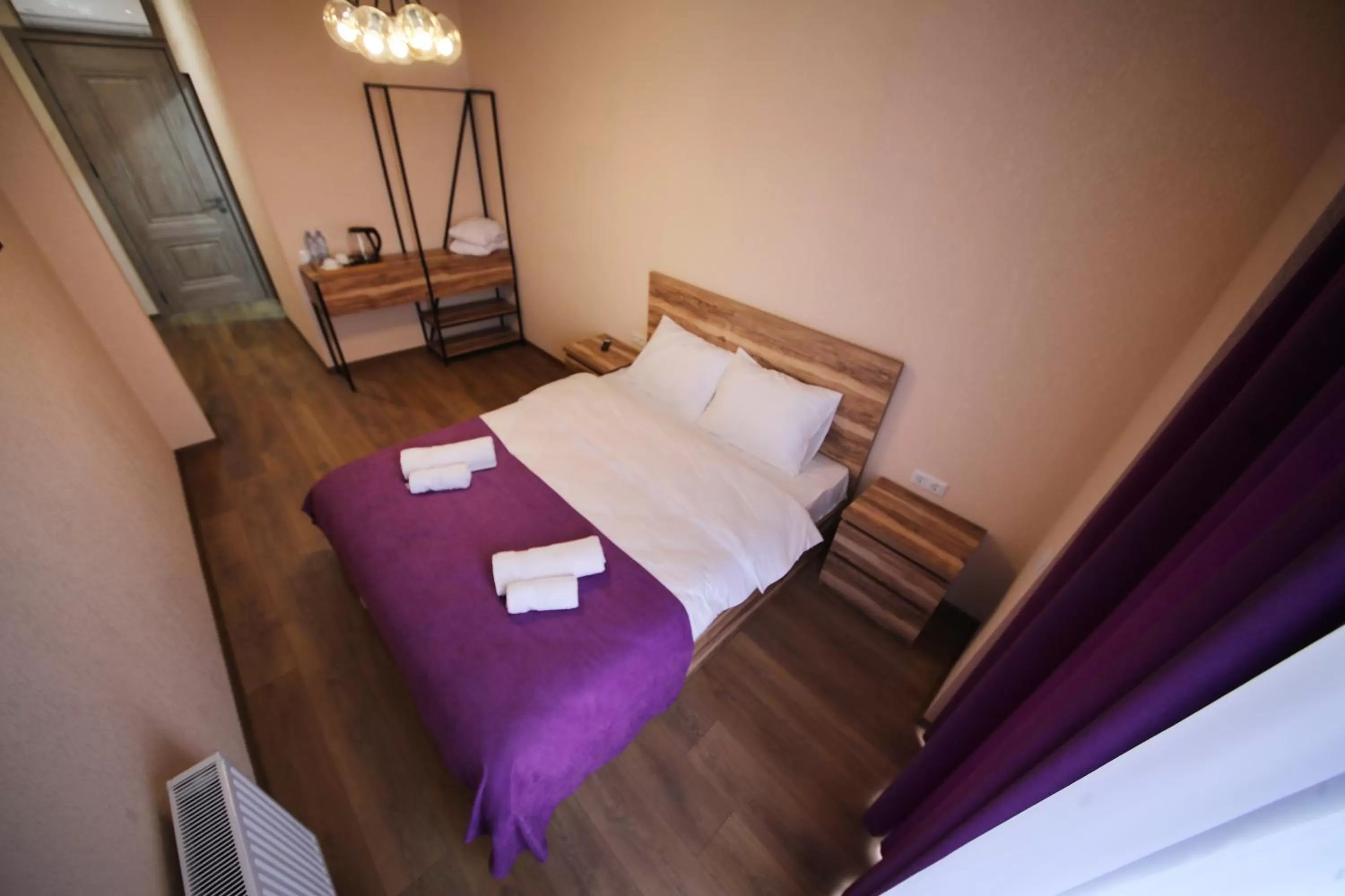 Bed in Bessarion Boutique Hotel