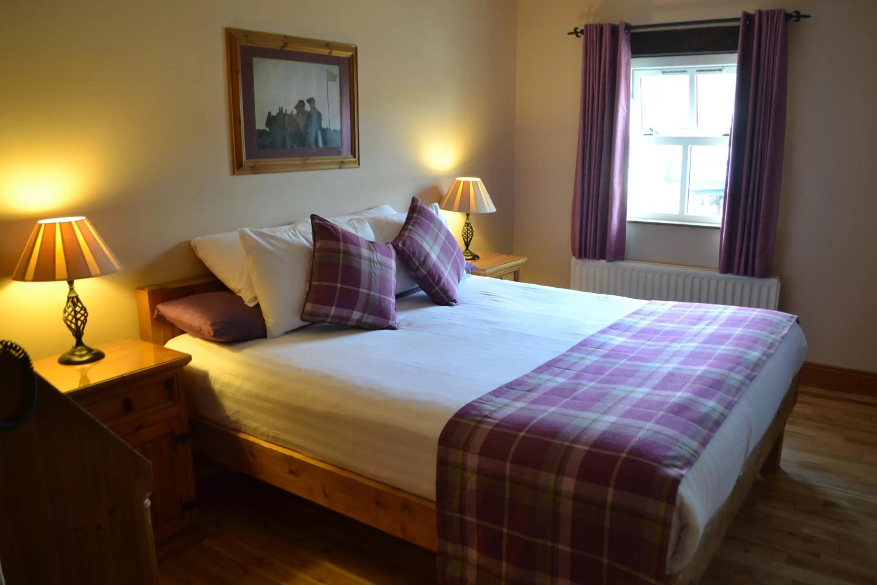 Bed in Walsh's Hotel and Apartments