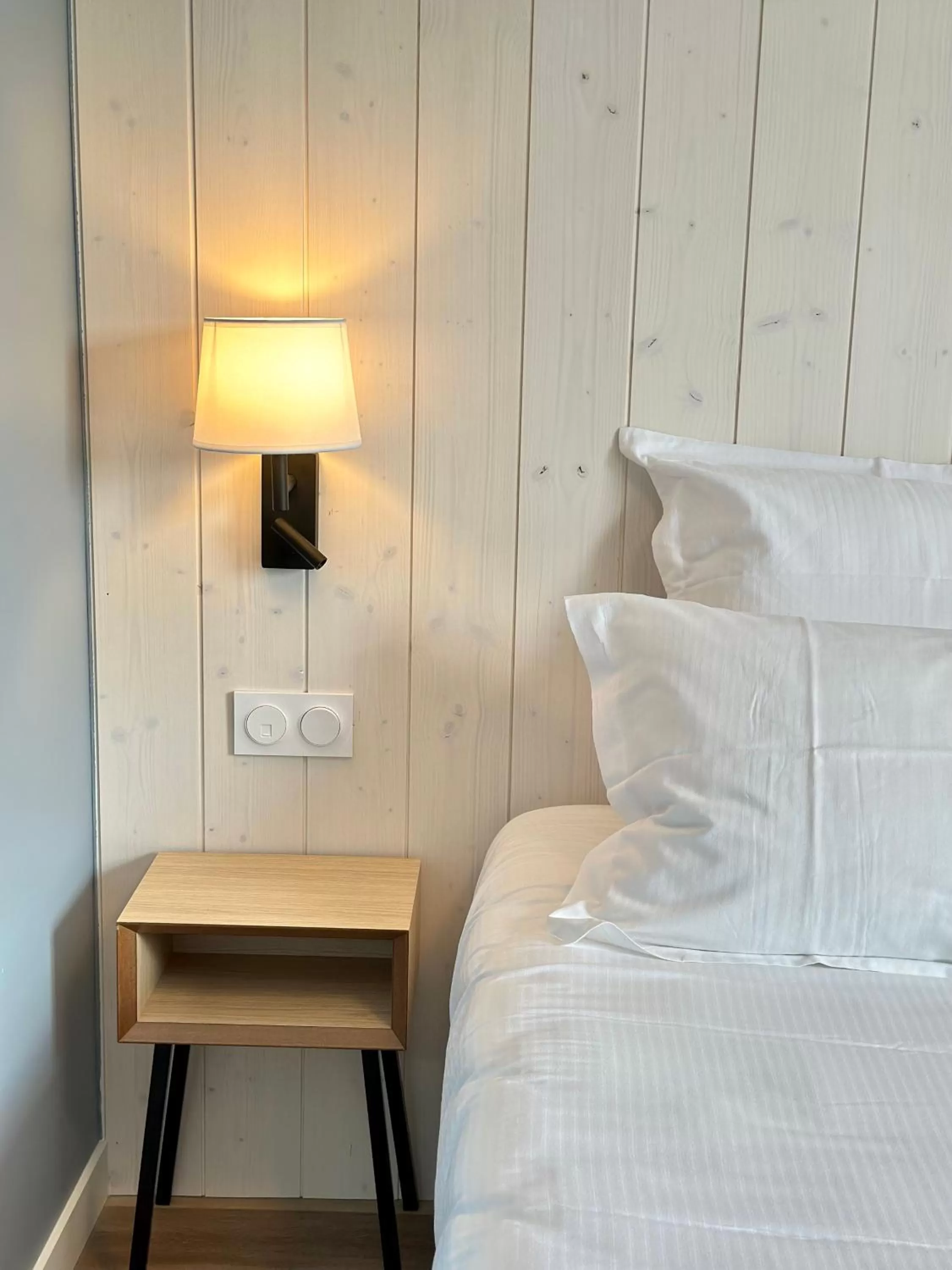 Bed in Hôtel de la Baie