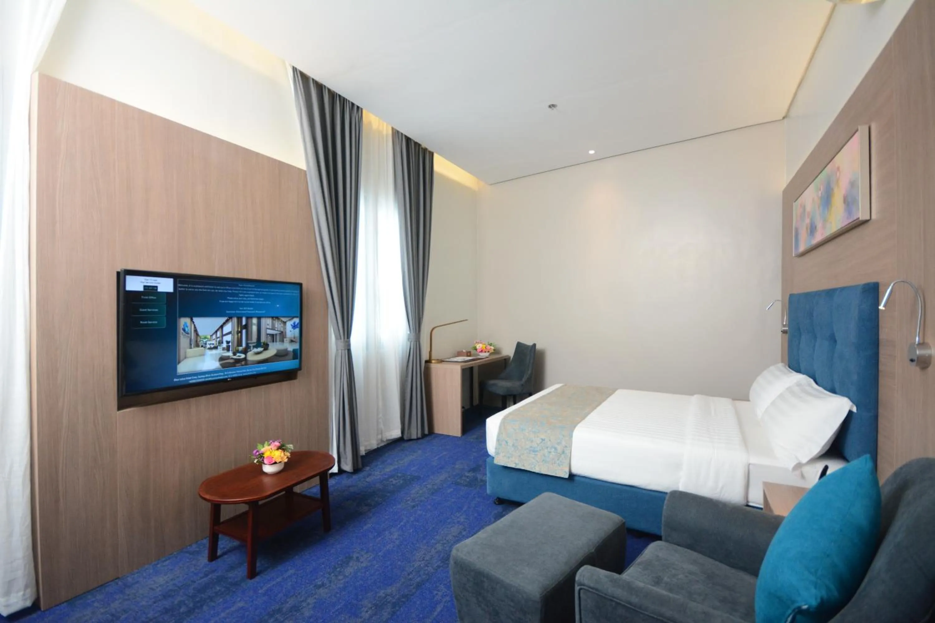 TV and multimedia, Bed in Blue Lotus Hotel
