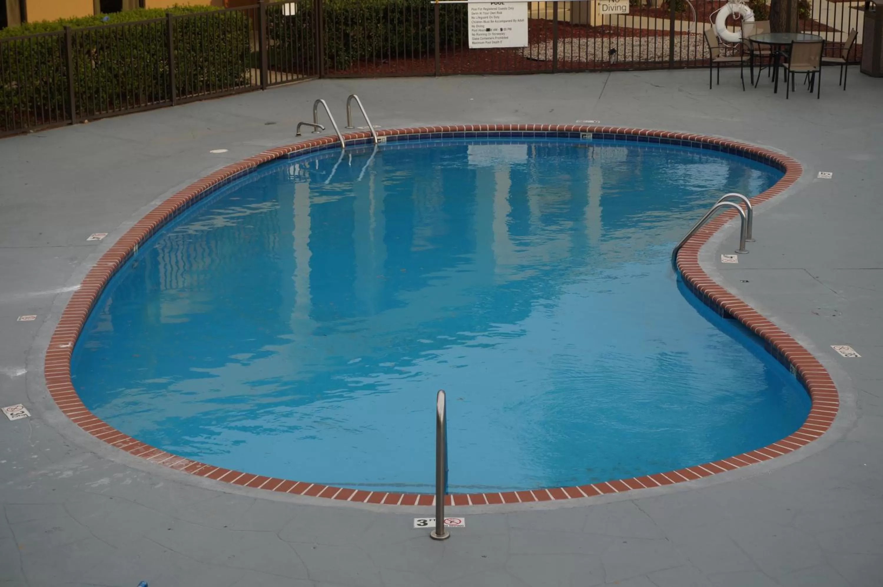 Swimming pool in Howard Johnson by Wyndham Greensboro Near the Coliseum