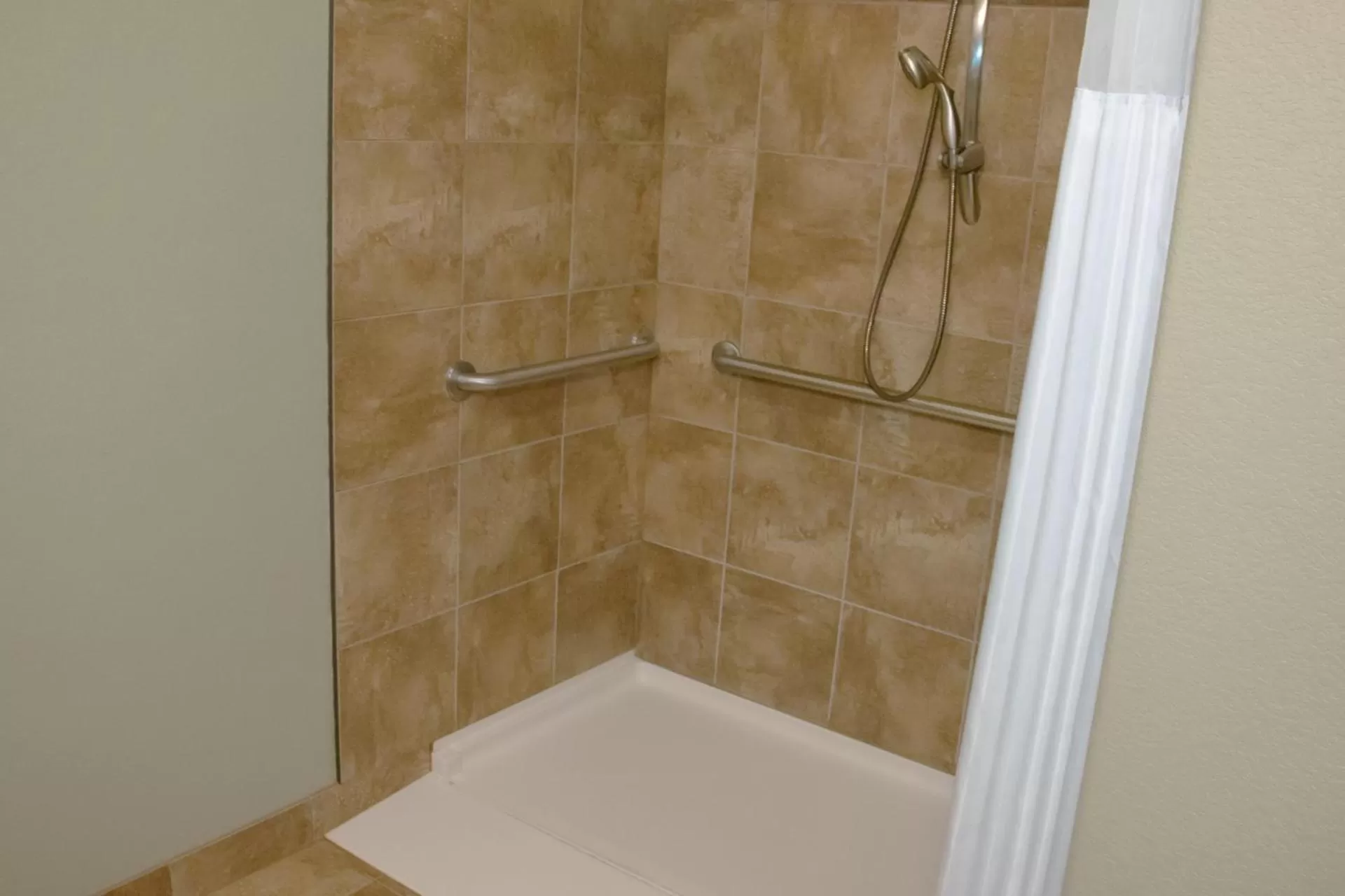 Shower in Grand Forks Lodge and Suites