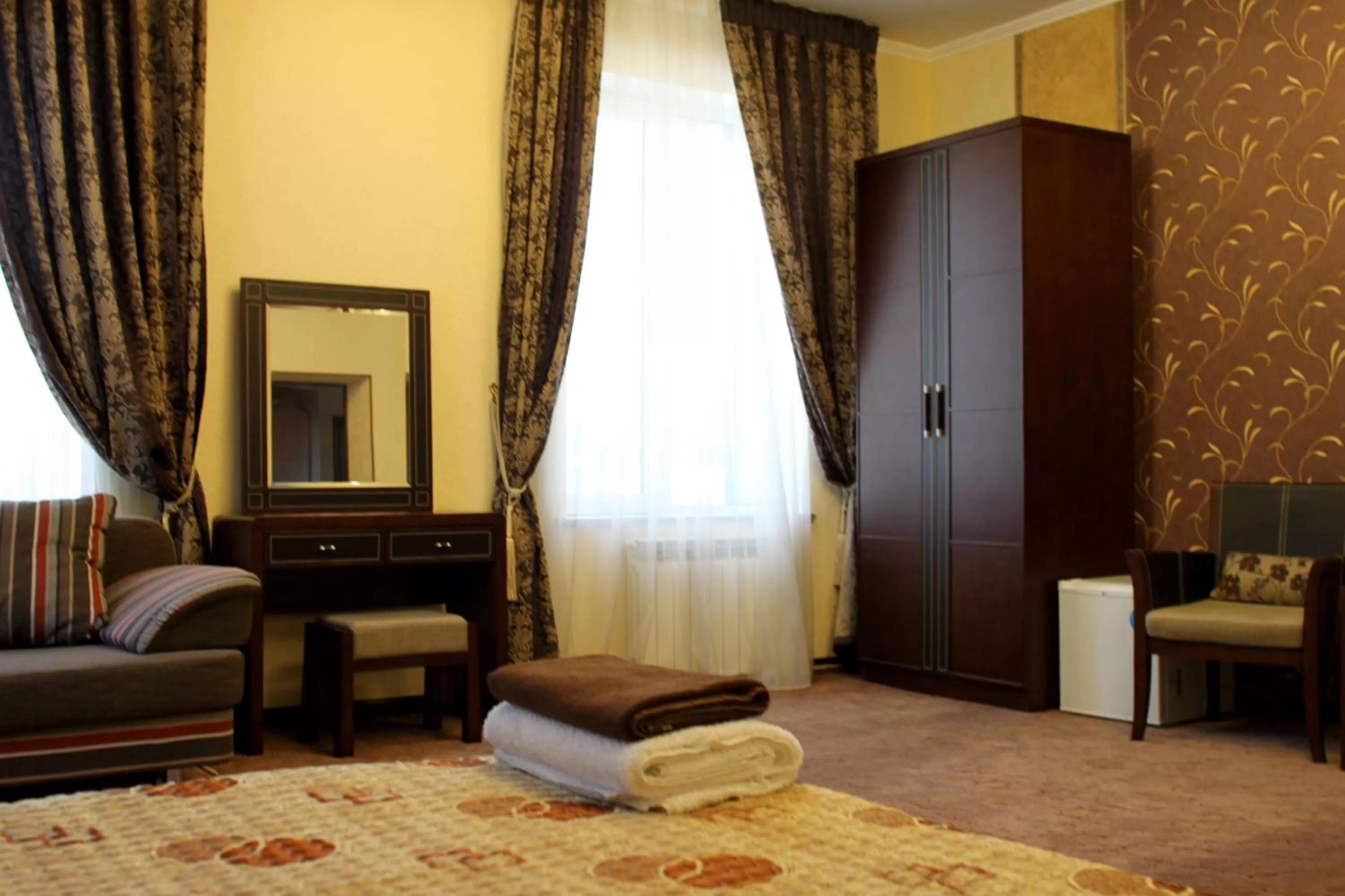 Photo of the whole room, Seating Area in Totem Hotel