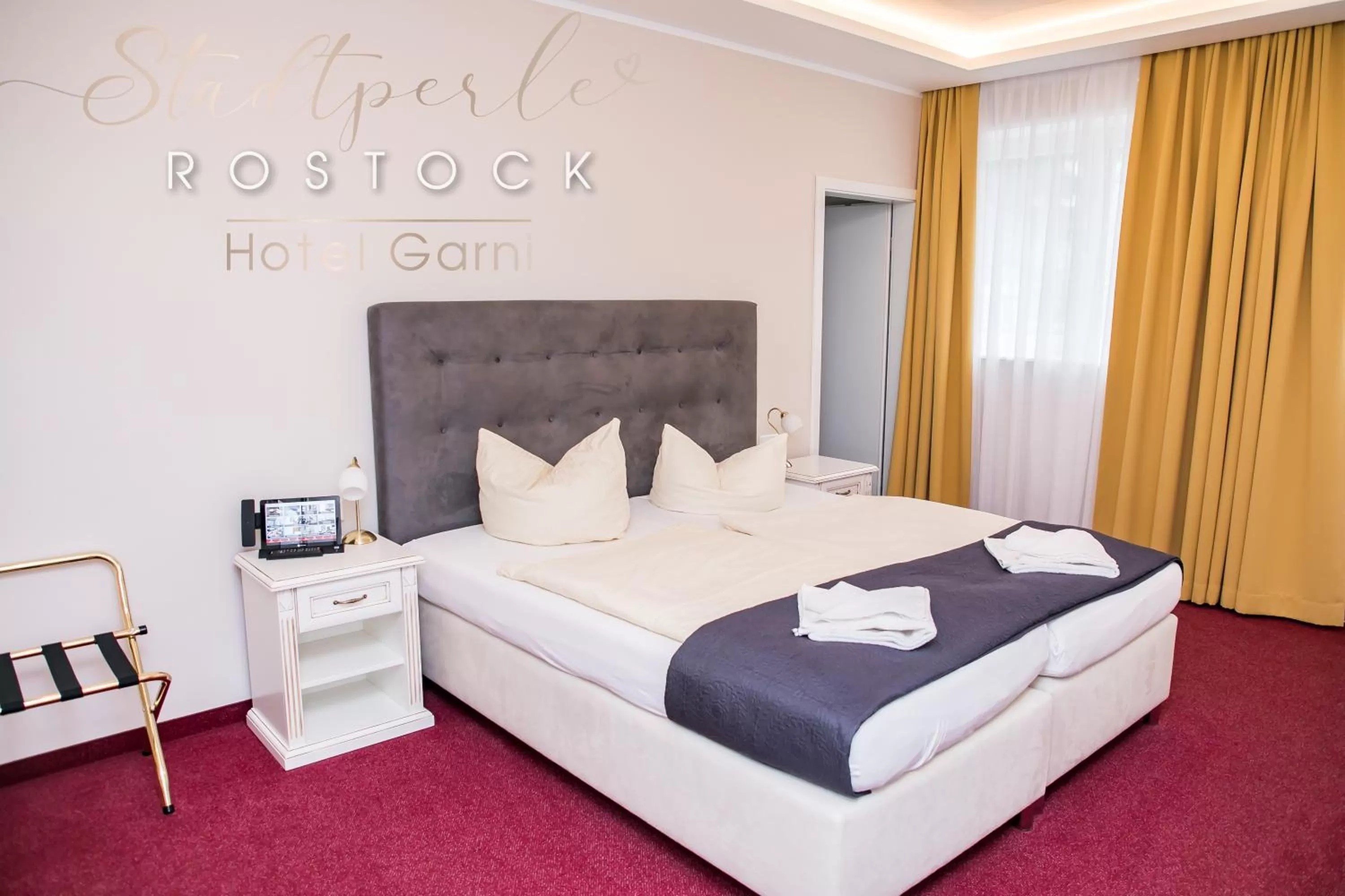 Photo of the whole room, Bed in Stadtperle Rostock