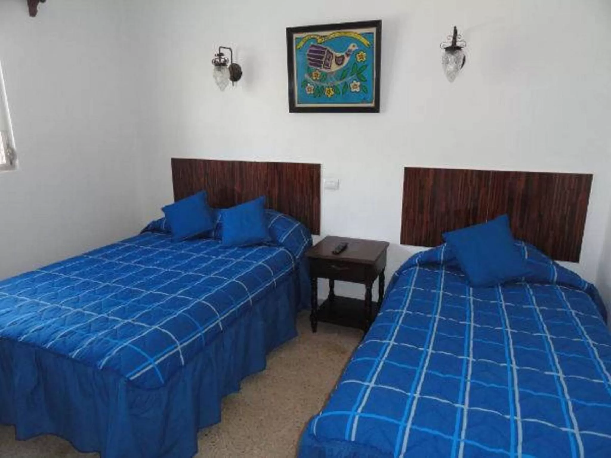 Bed in Hotel Las Dalias Inn