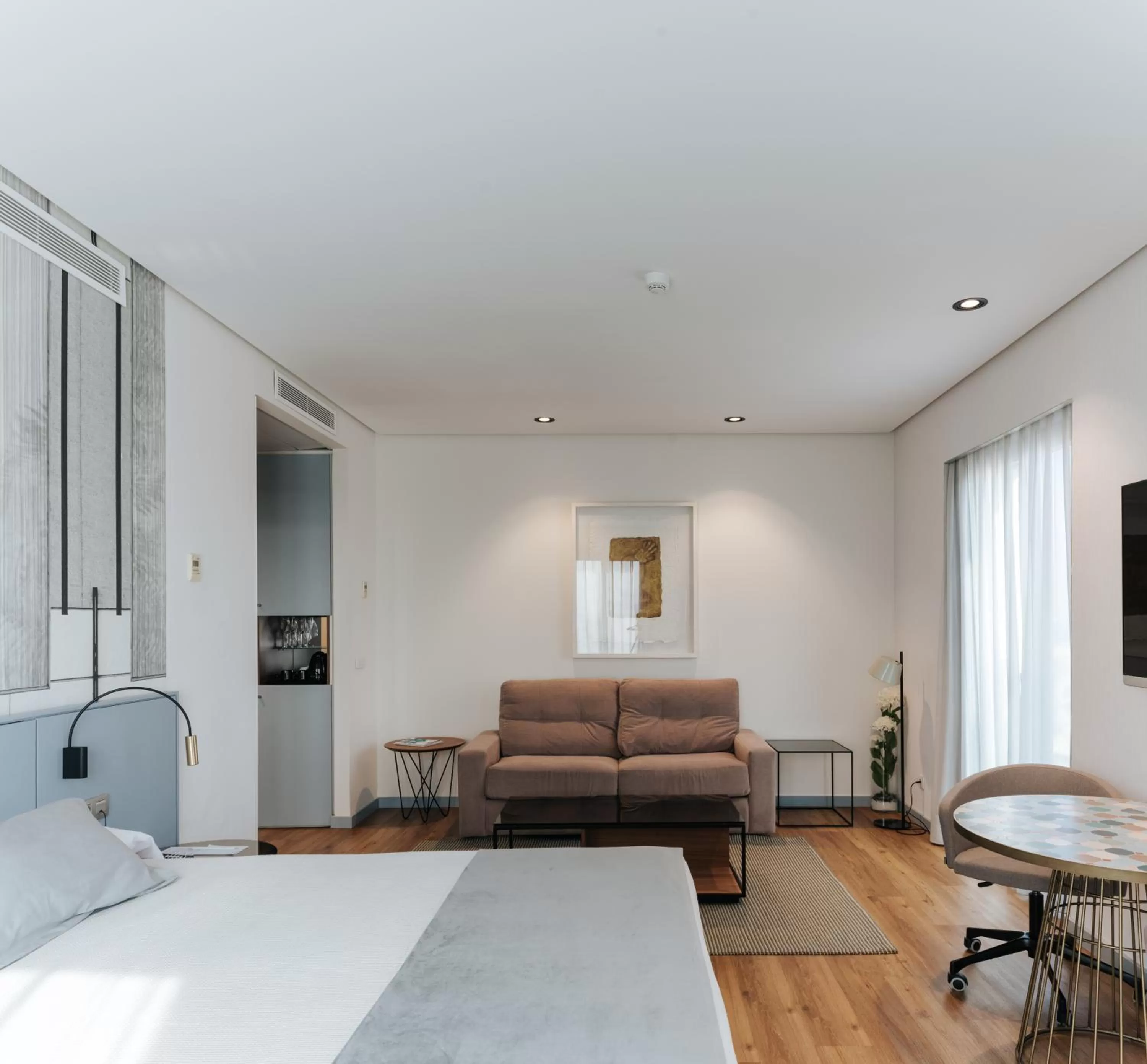 Living room, Bed in Hotel Neptuno Playa & Spa