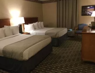 Photo of the whole room, Bed in Days Inn & Suites by Wyndham Sellersburg