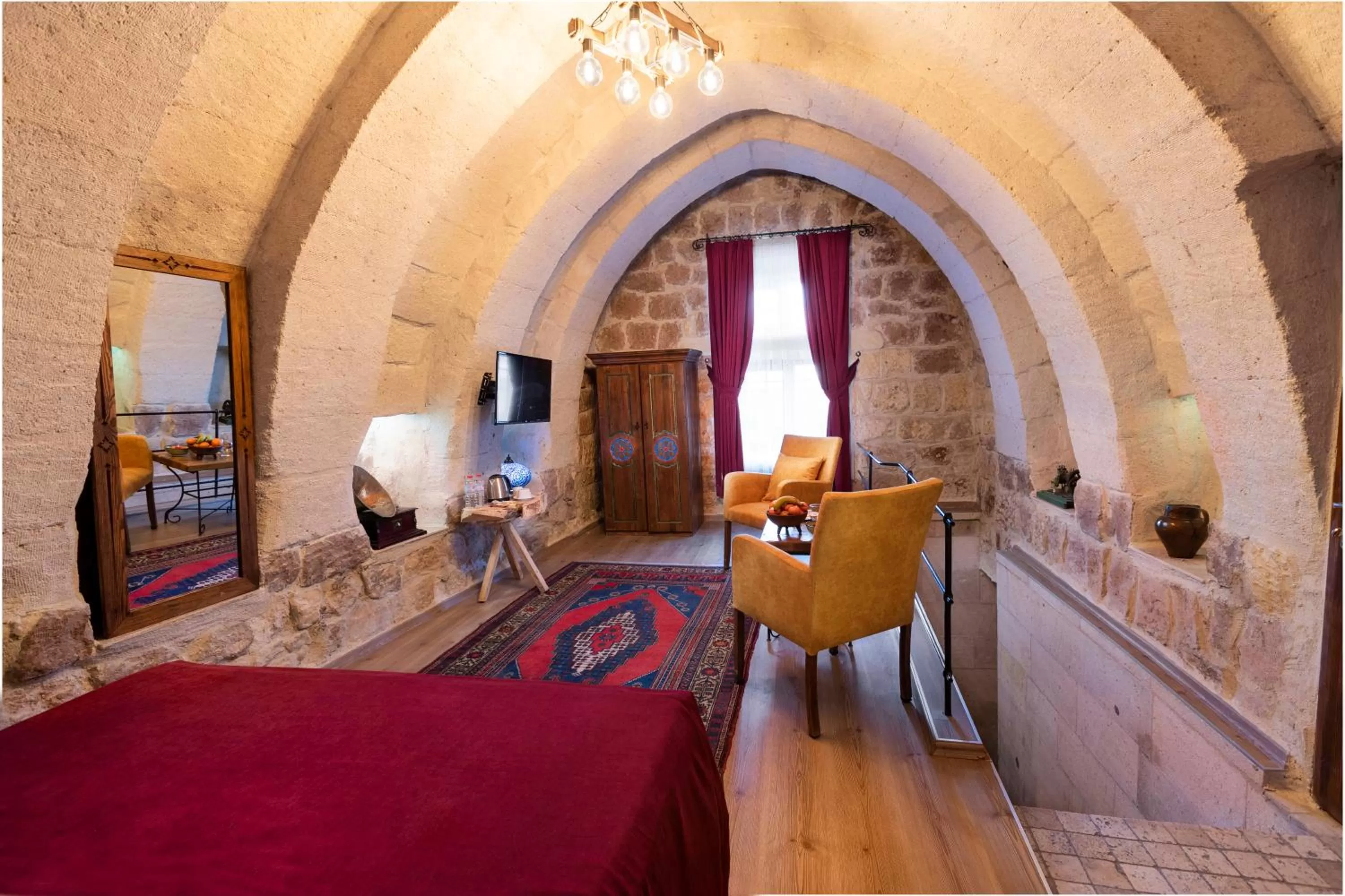 Seating area, Bed in Maron Stone House