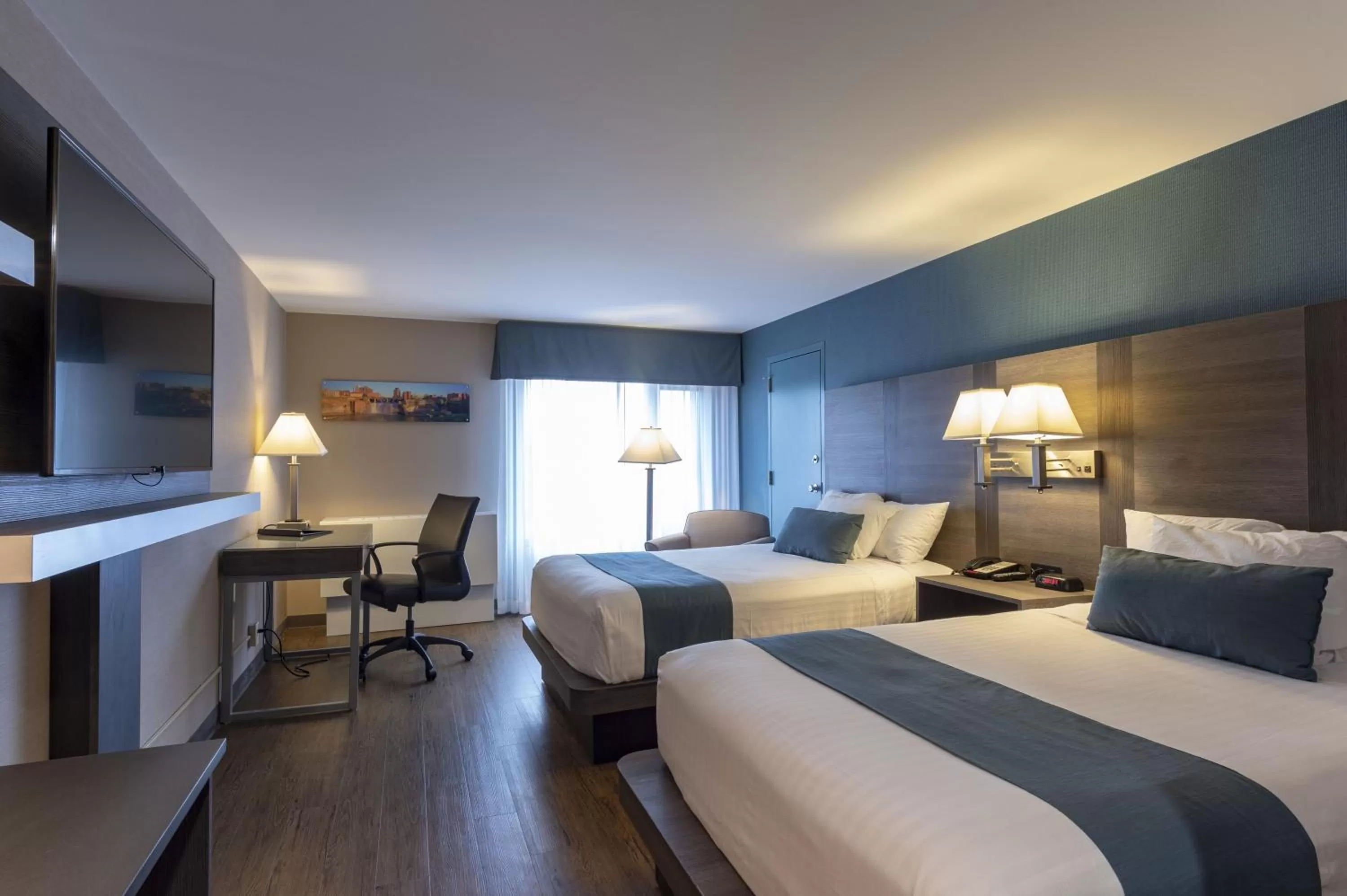 Bed in RIT Inn & Conference Center