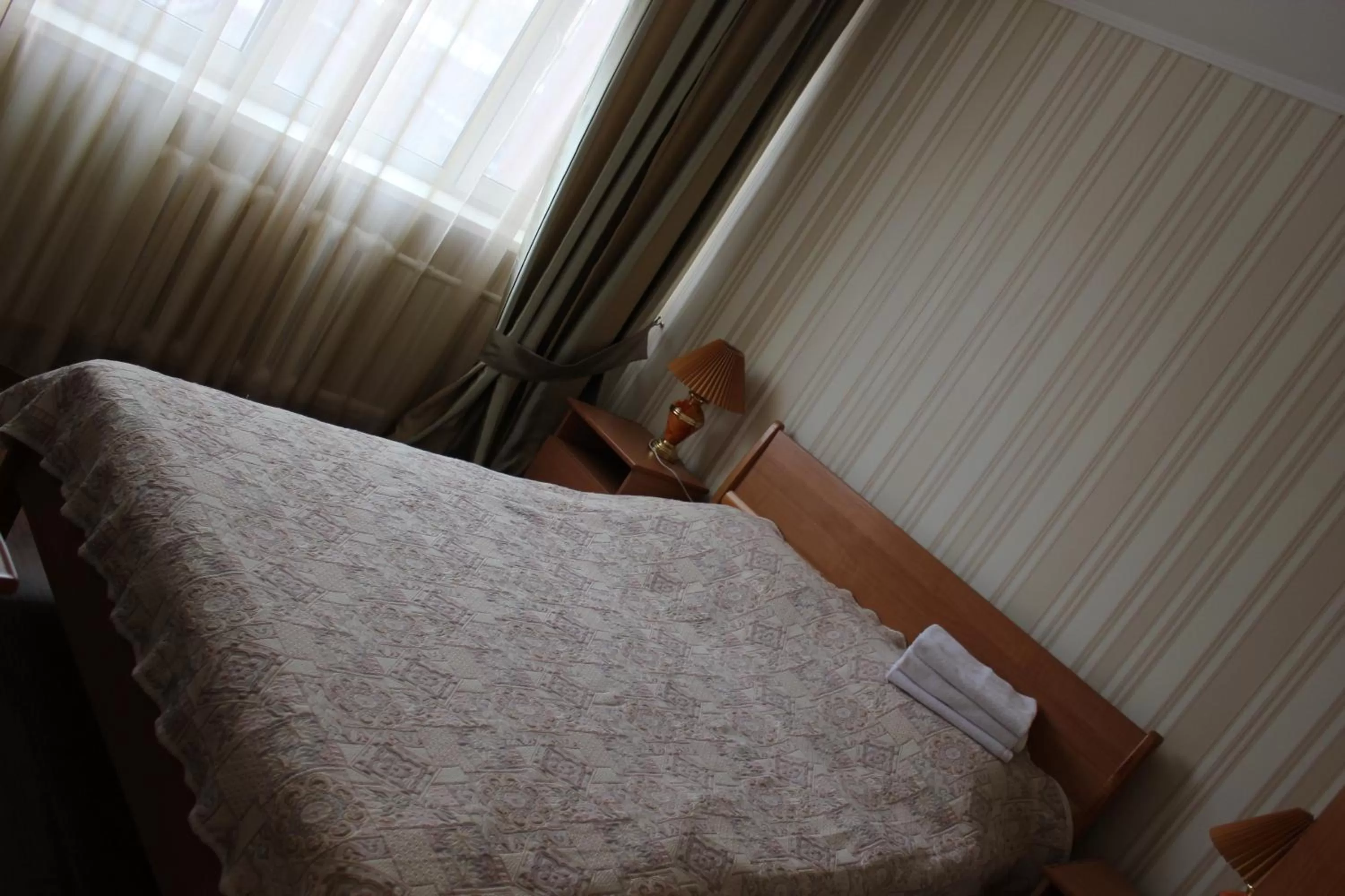 Bed in Ust-Kamenogorsk Hotel