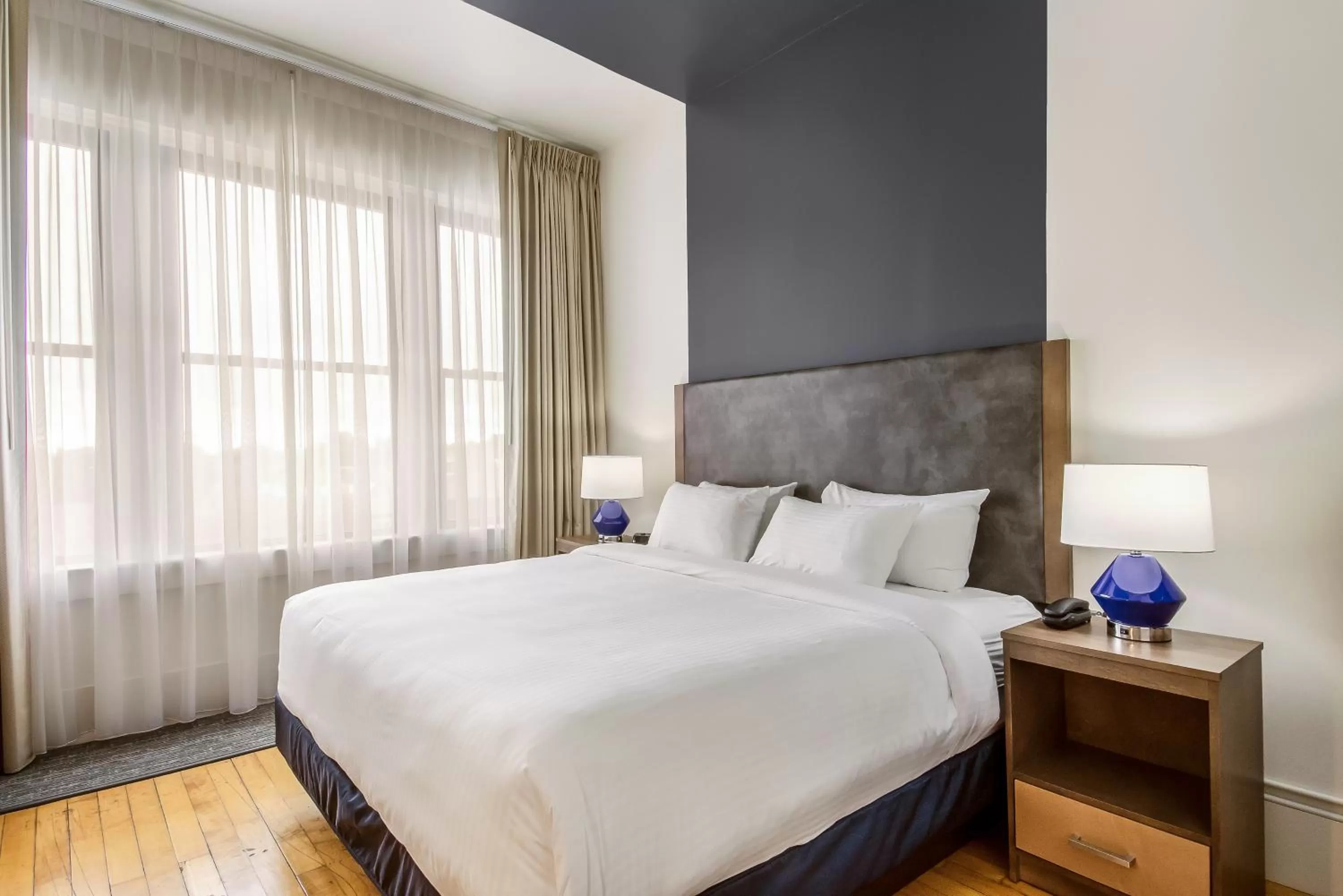 Bed in New Bedford Harbor Hotel, an Ascend Collection Hotel