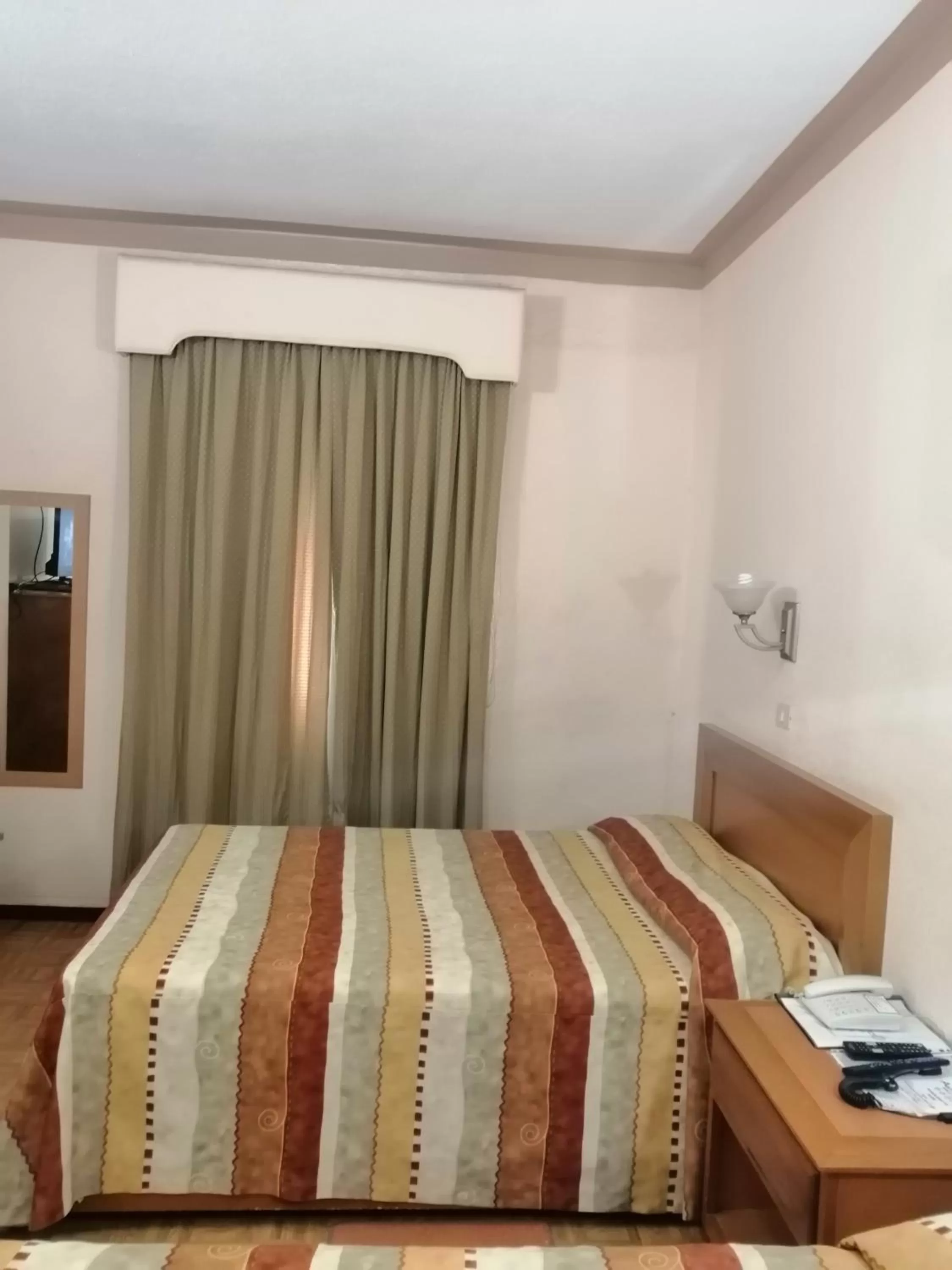 Bed in Hotel Astromundo