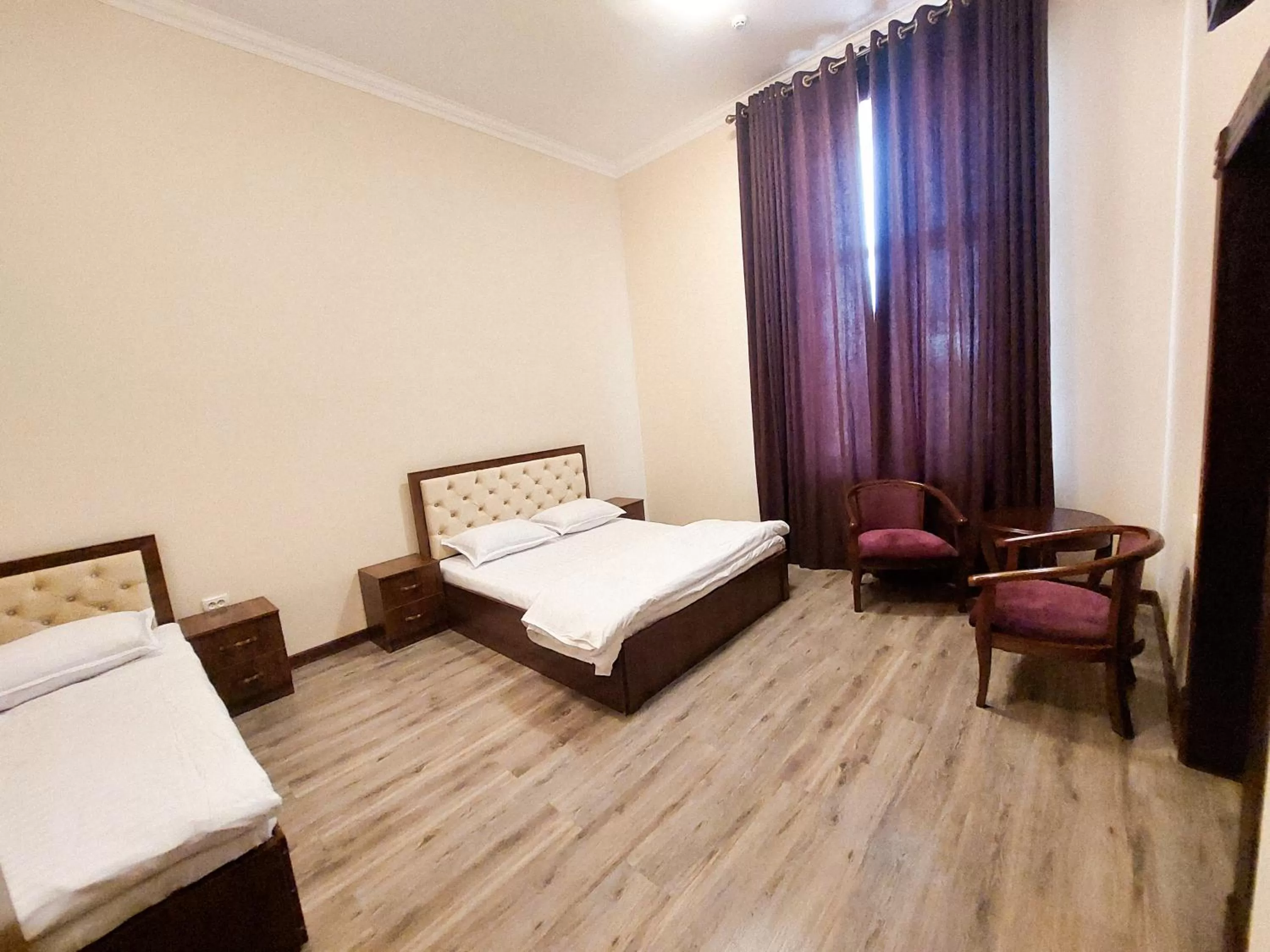 Photo of the whole room, Bed in Samarabonu Hotel