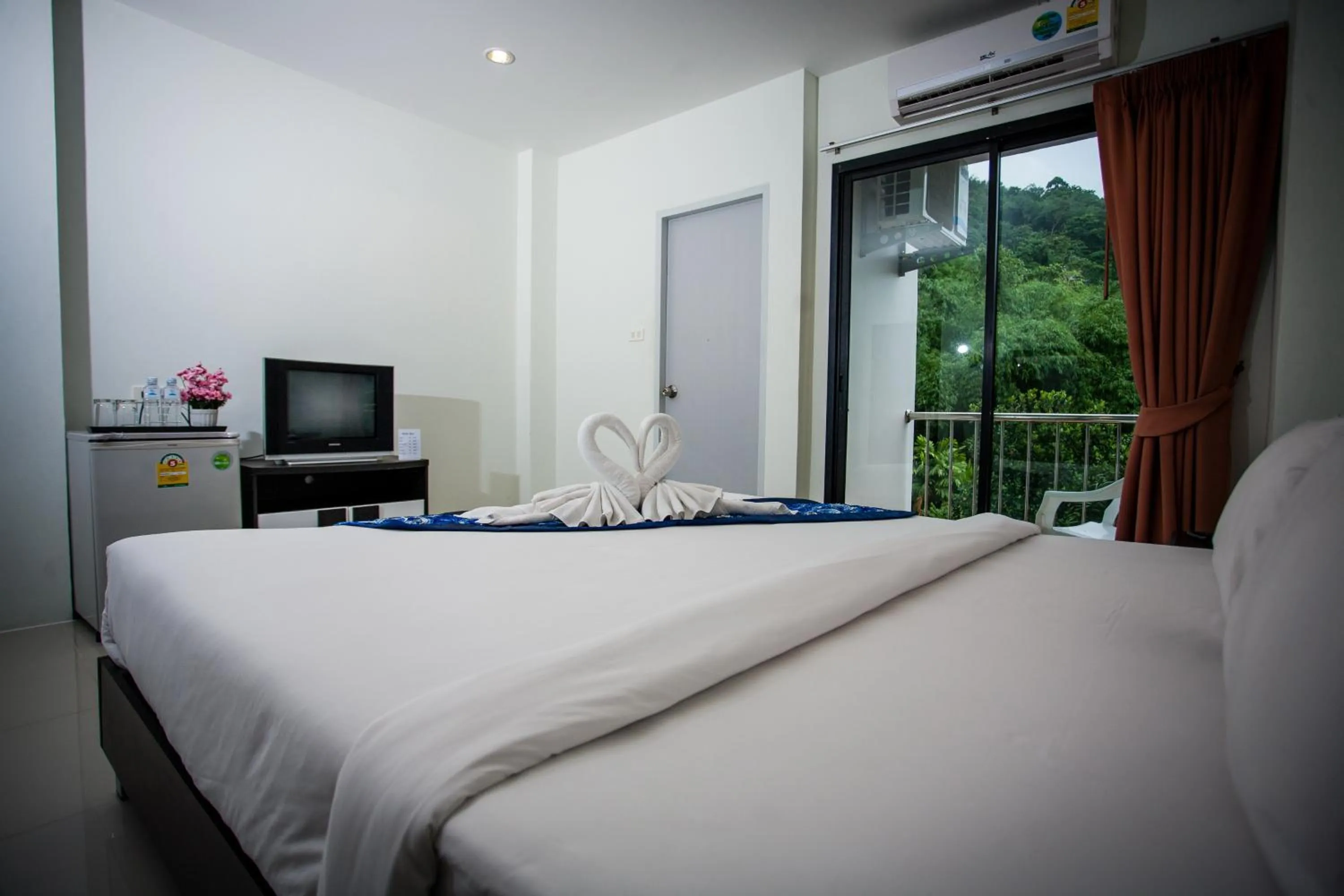 Bed in The Wave Hotel Patong SHA