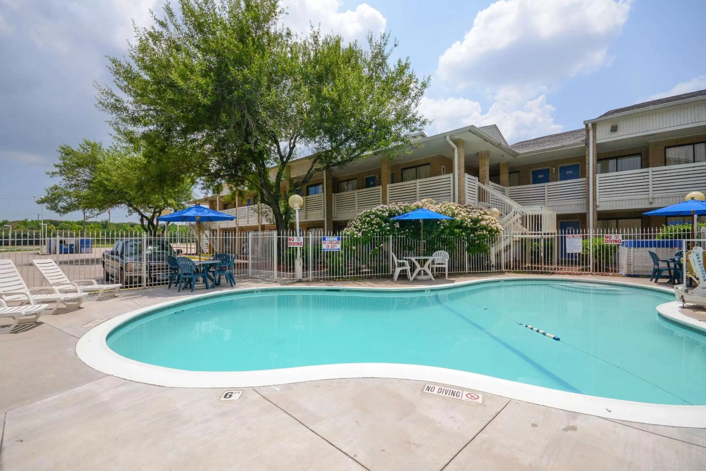 Pool view in Motel 6-Baytown, TX - Baytown East
