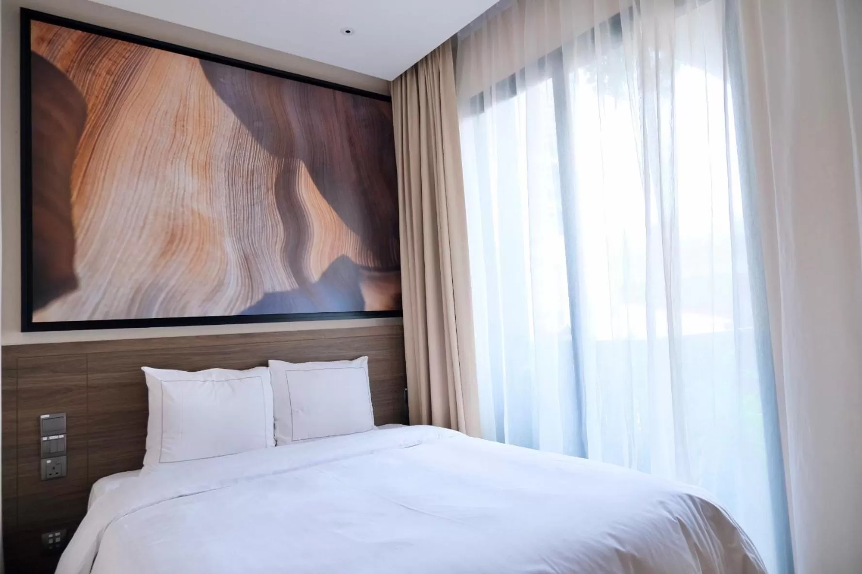 Bed in L Hotel Premier By Lion Peak