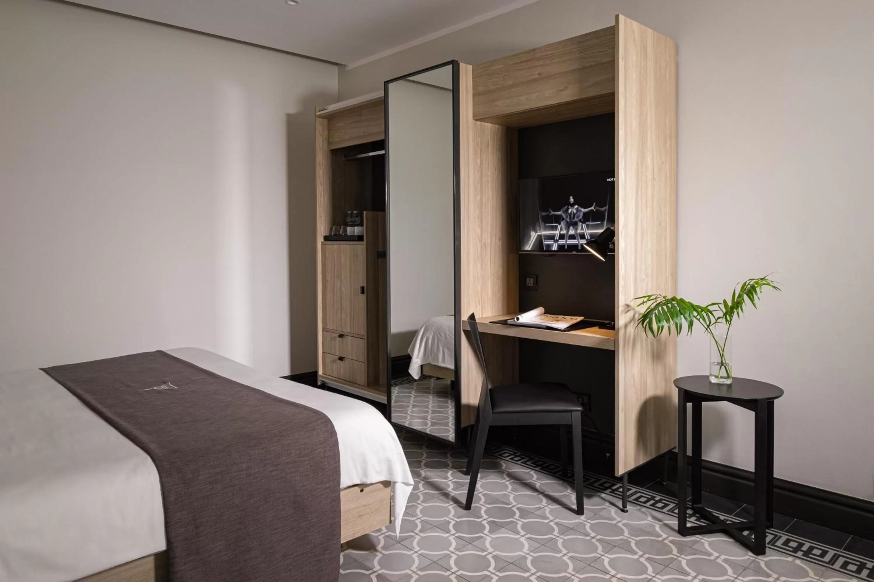 Bed in La Falconeria Hotel