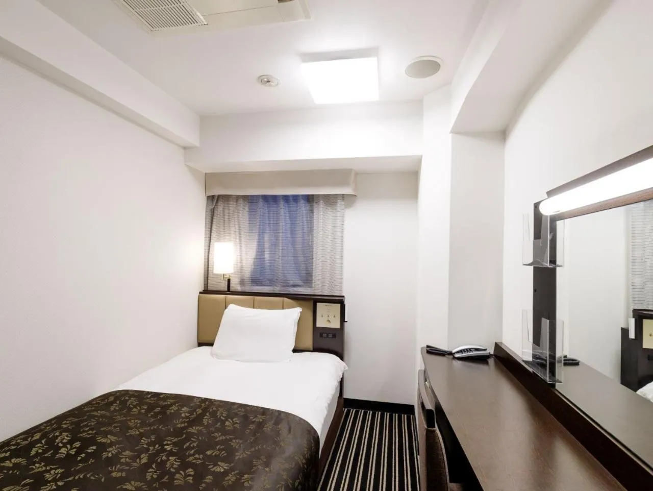 Bed in APA Hotel Ginza Kyobashi Tokyo Eki Yaesu Minamiguchi