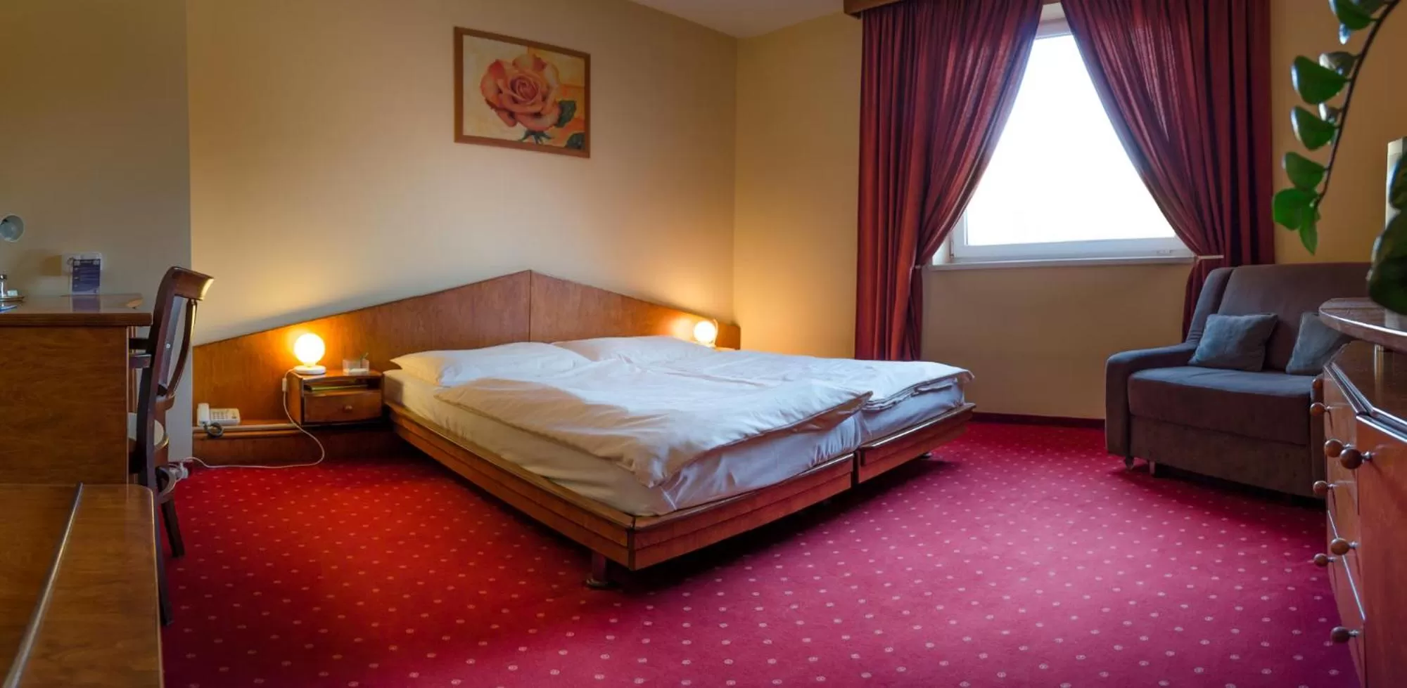 Living room, Bed in Hotel West