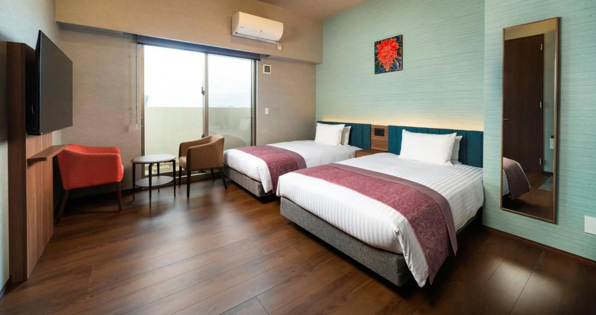 Photo of the whole room, Bed in HOTEL SANSUI NAHA Ryukyu Onsen Naminoue-No-Yu