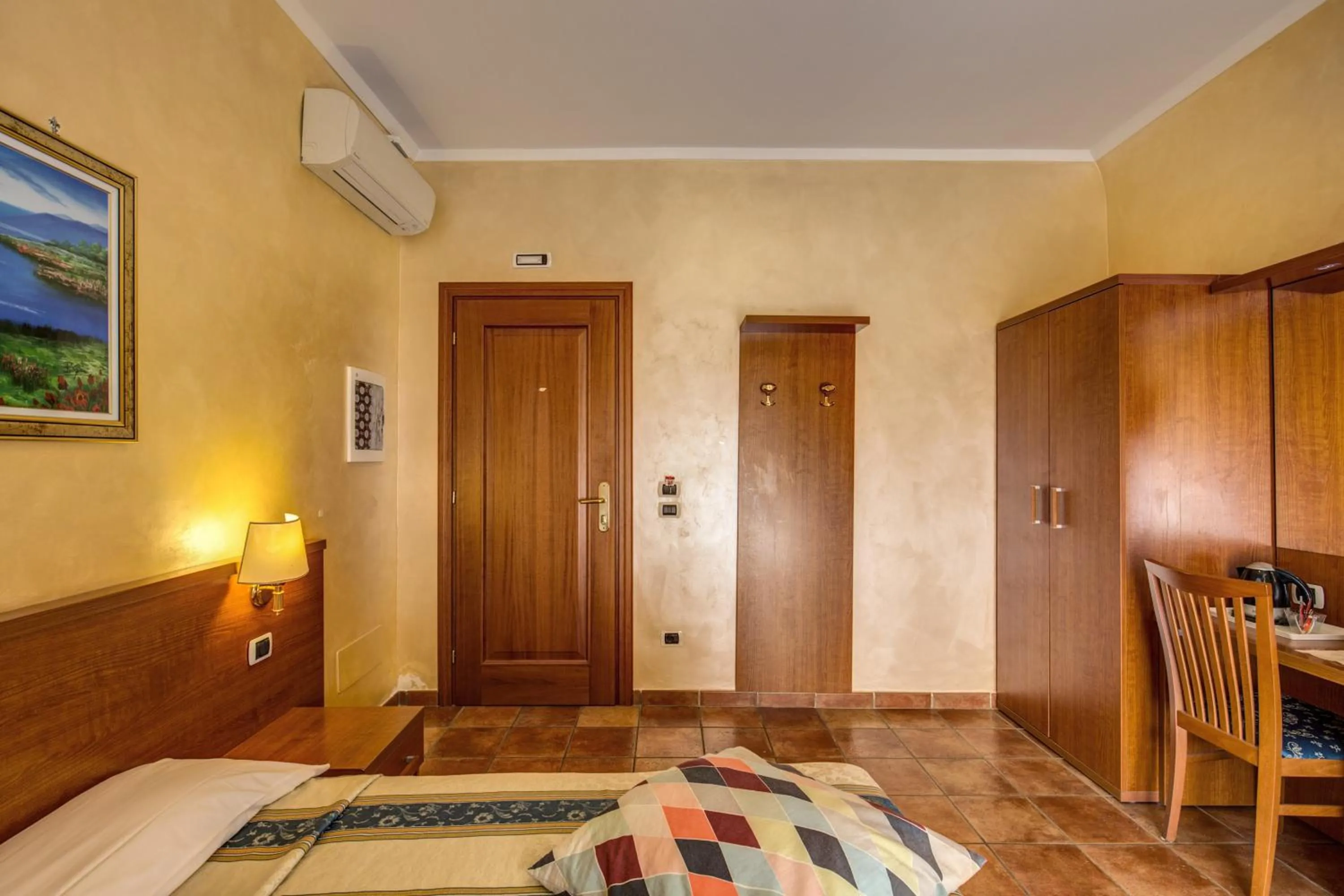 Bed in Hotel Maryelen