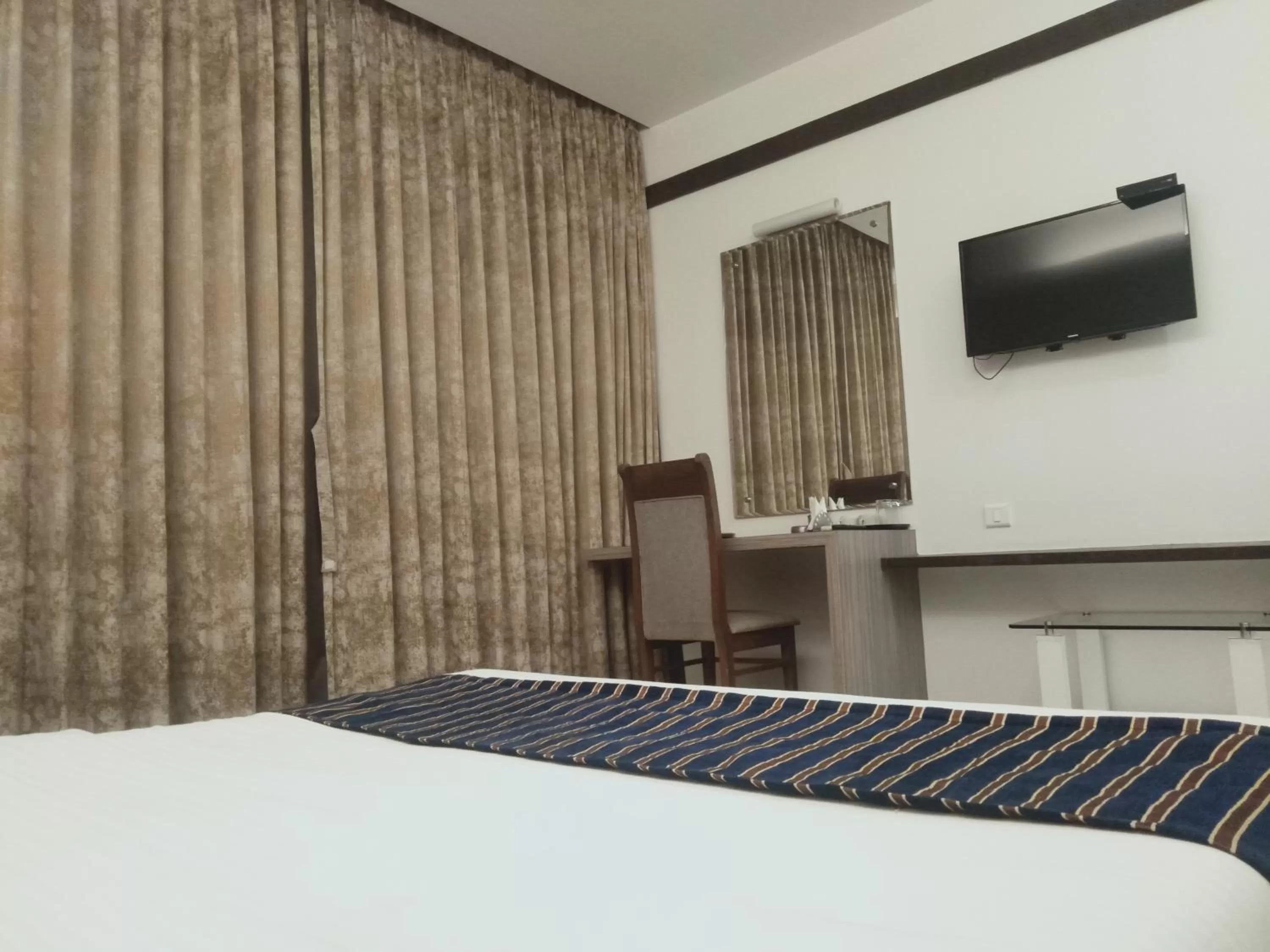 Bed in Hotel Udayanraje Palace