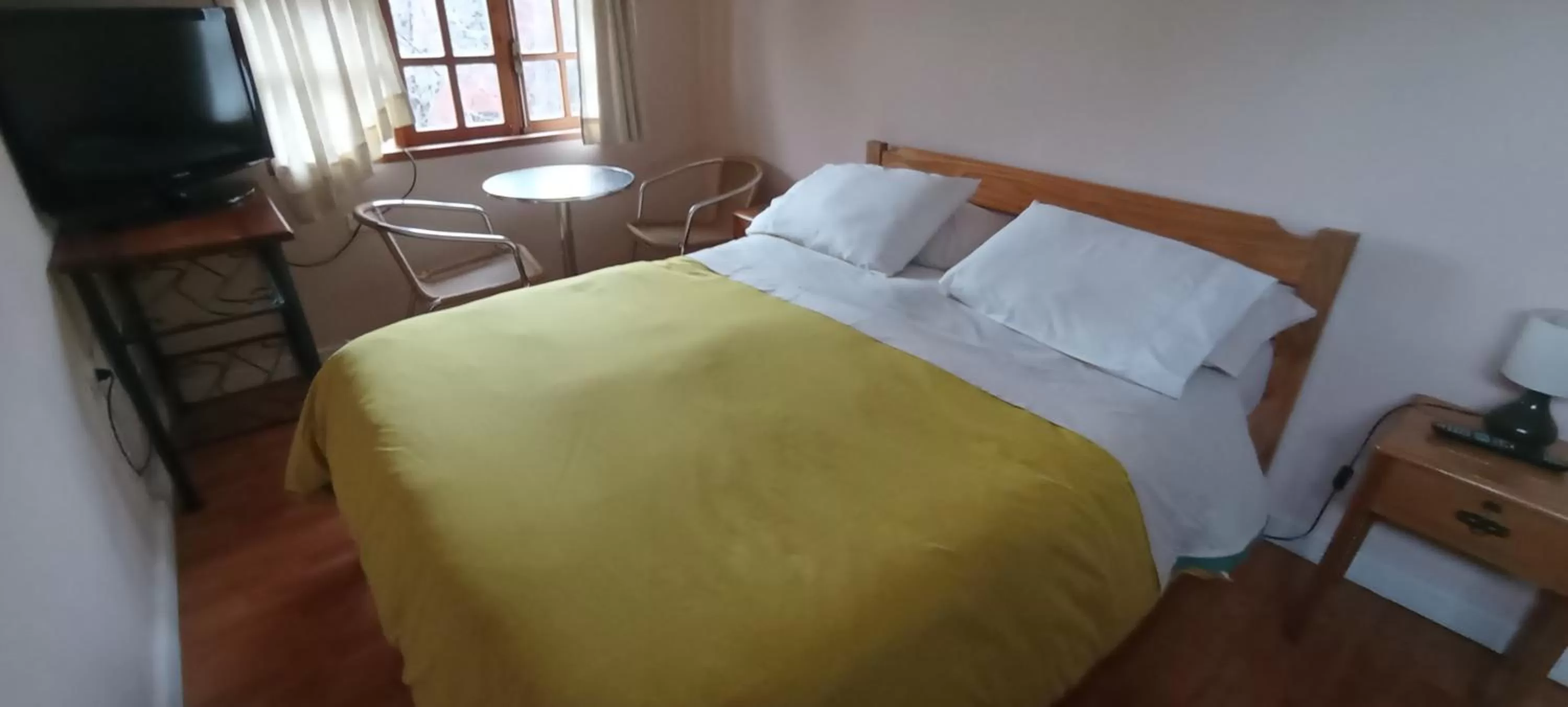 Bed in Omi Kika B&B