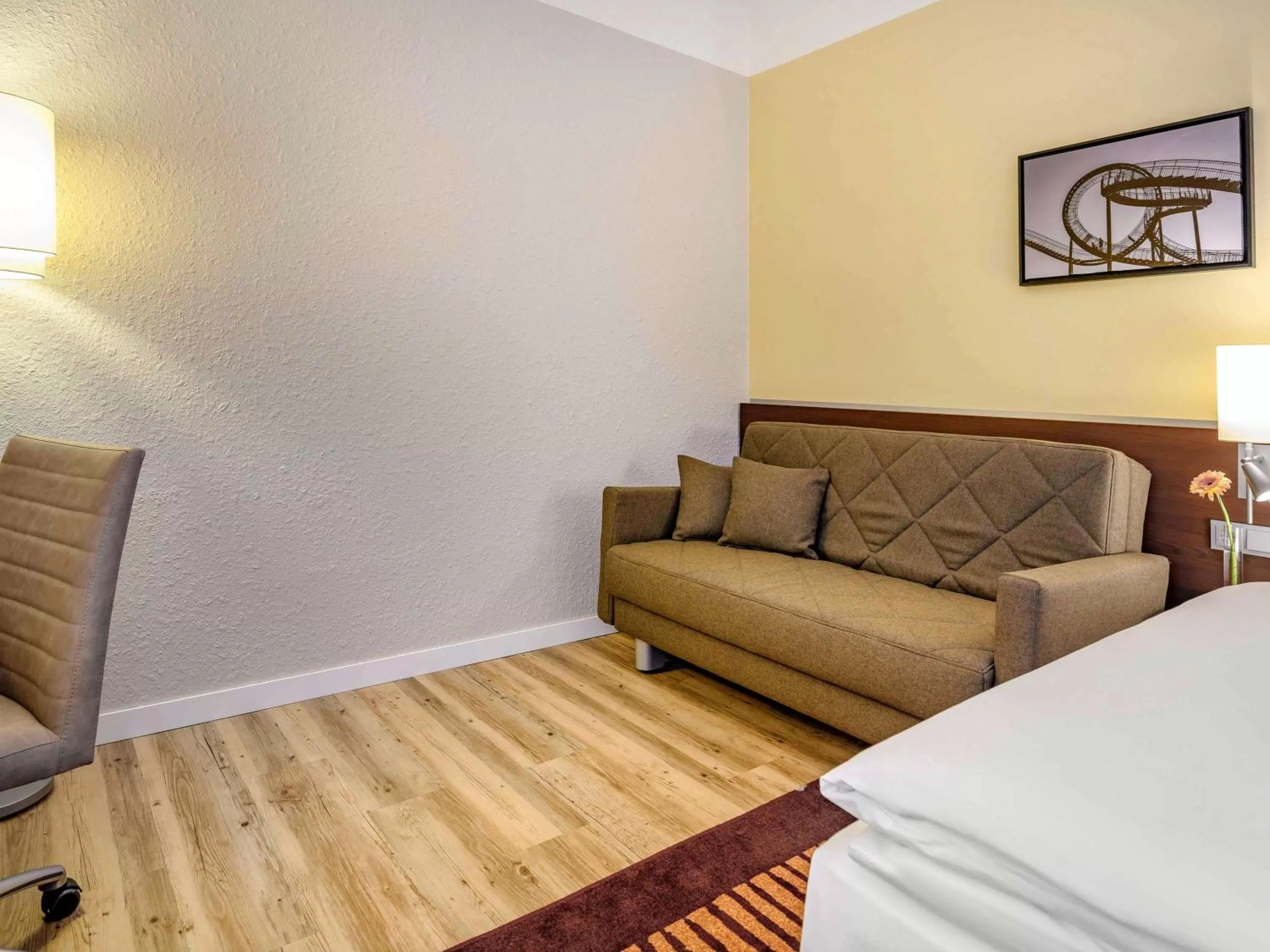 Photo of the whole room, Bed in Mercure Hotel Duisburg City