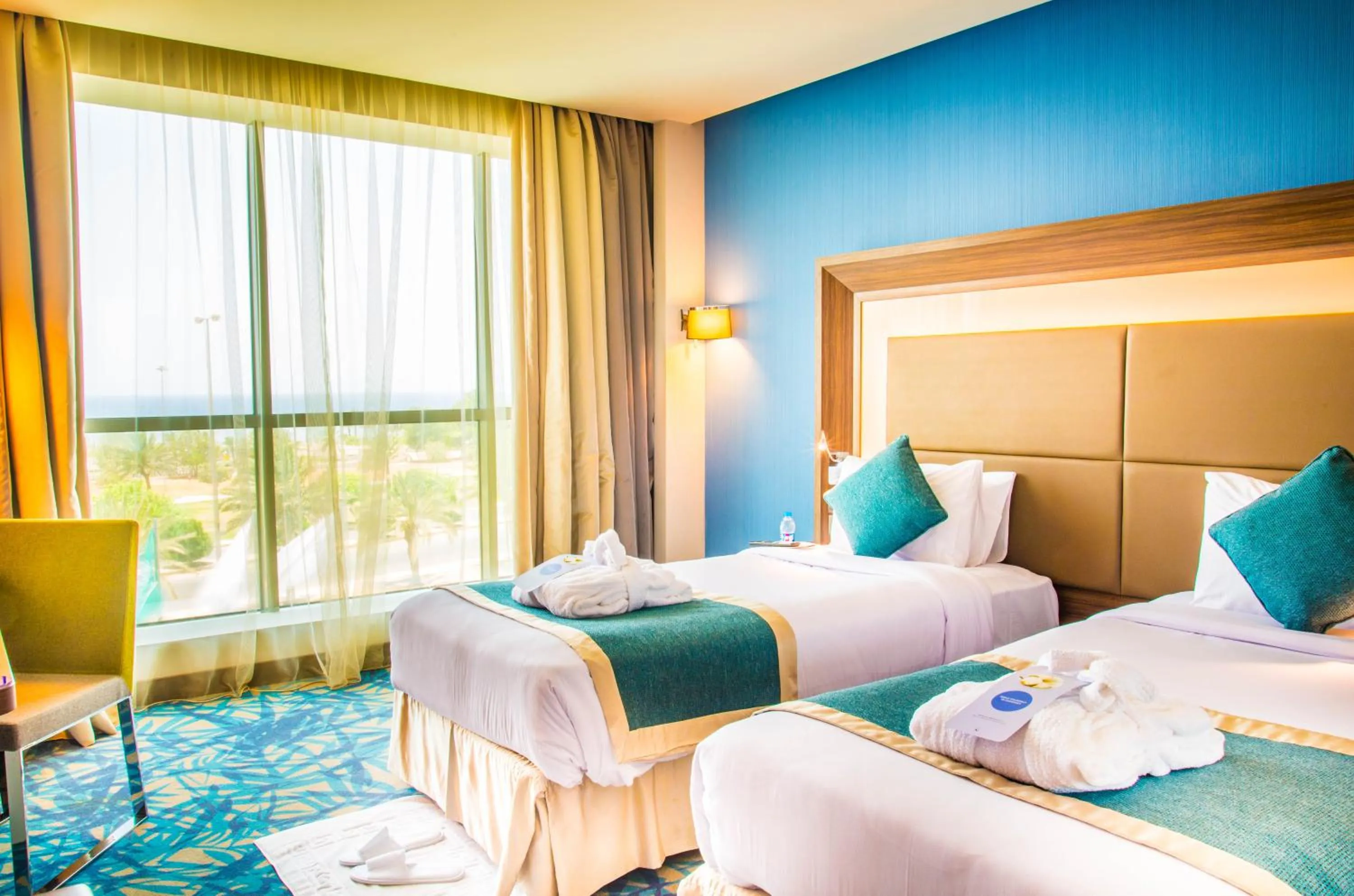 Two-Bedroom Superior Suite with Double Bed and Sofa Bed with Sea or City View in Novotel Yanbu Albahr