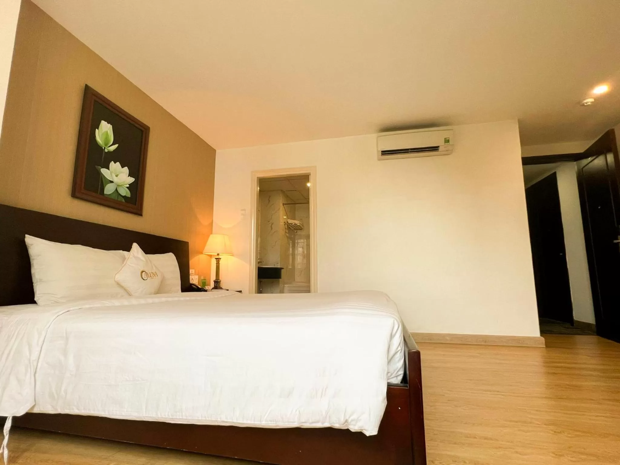 Bed in ALUNA Ben Thanh Hotel