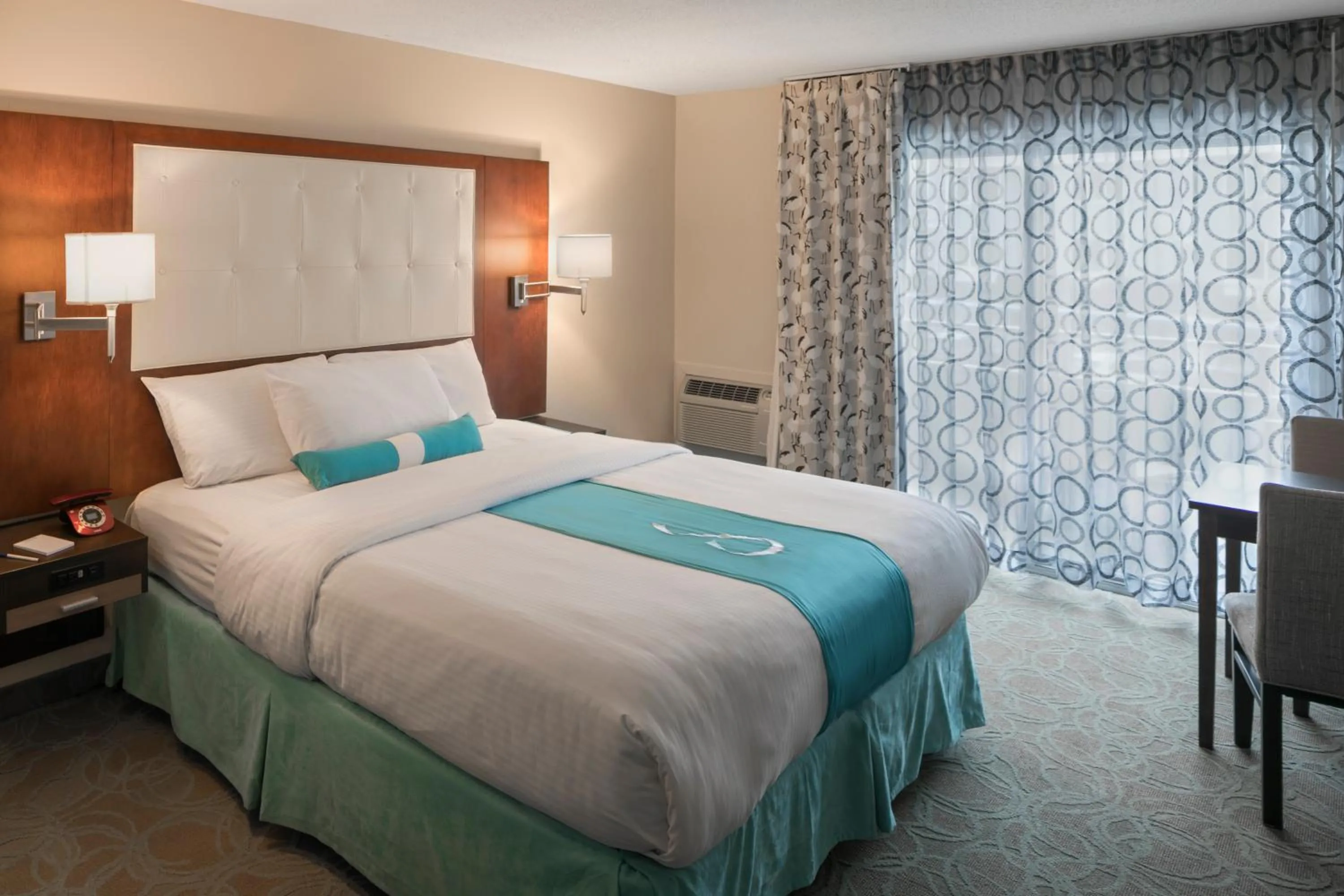 Bed in Aqua Blue Hotel