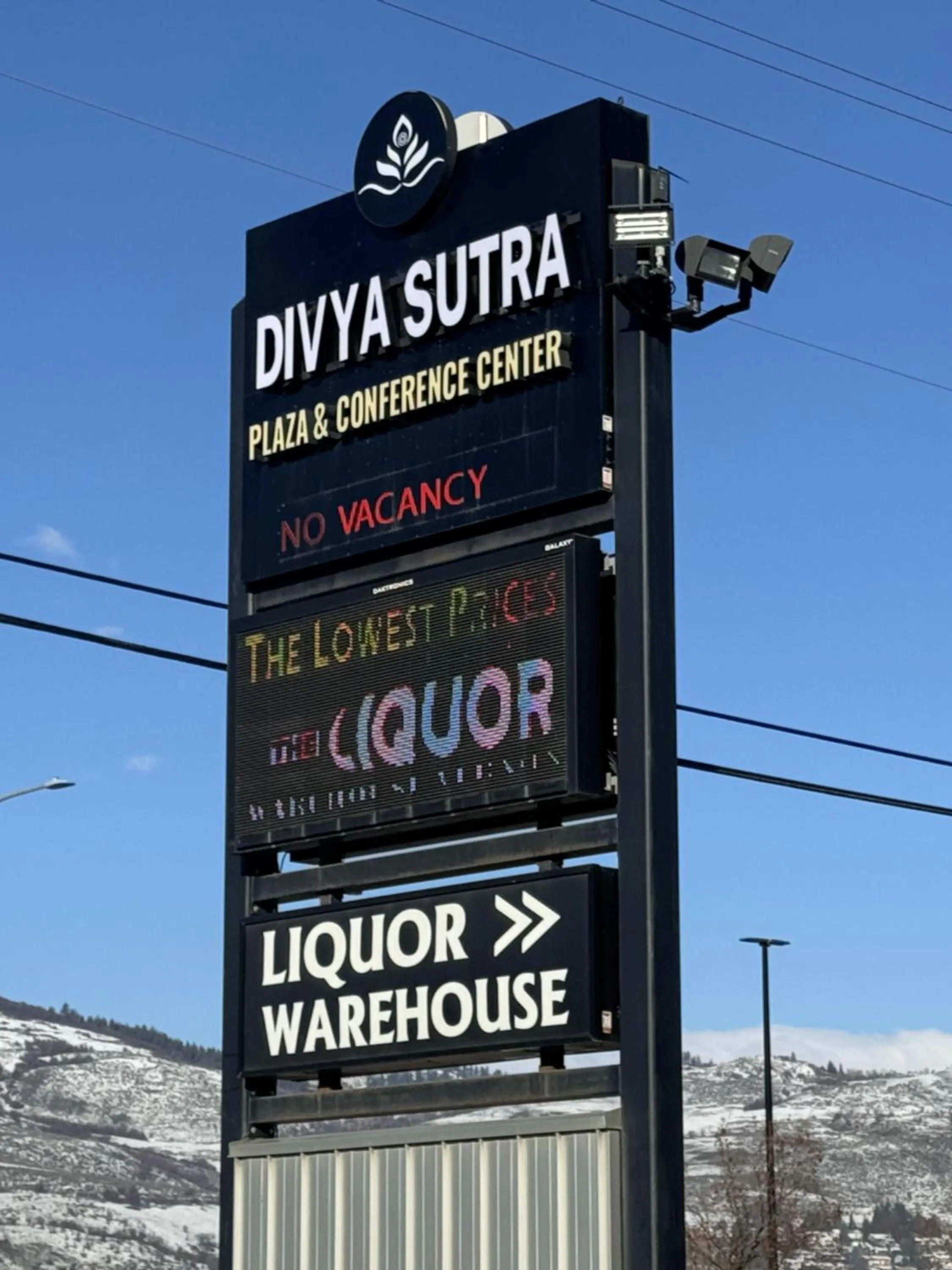 Property logo or sign in Divya Sutra Plaza and Conference Centre, Vernon, BC