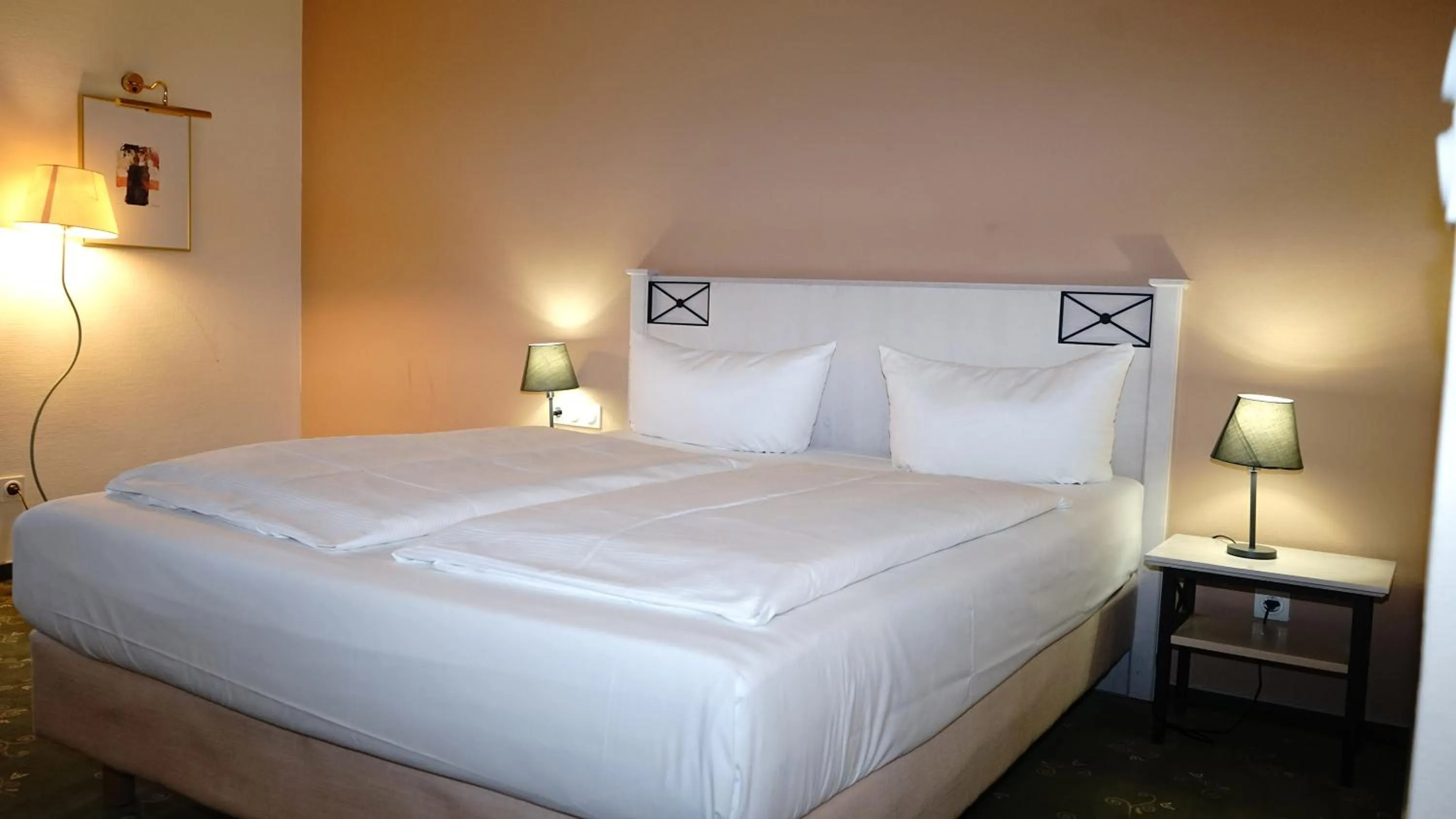 Bed in Entrée Groß Borstel Garni Hotel