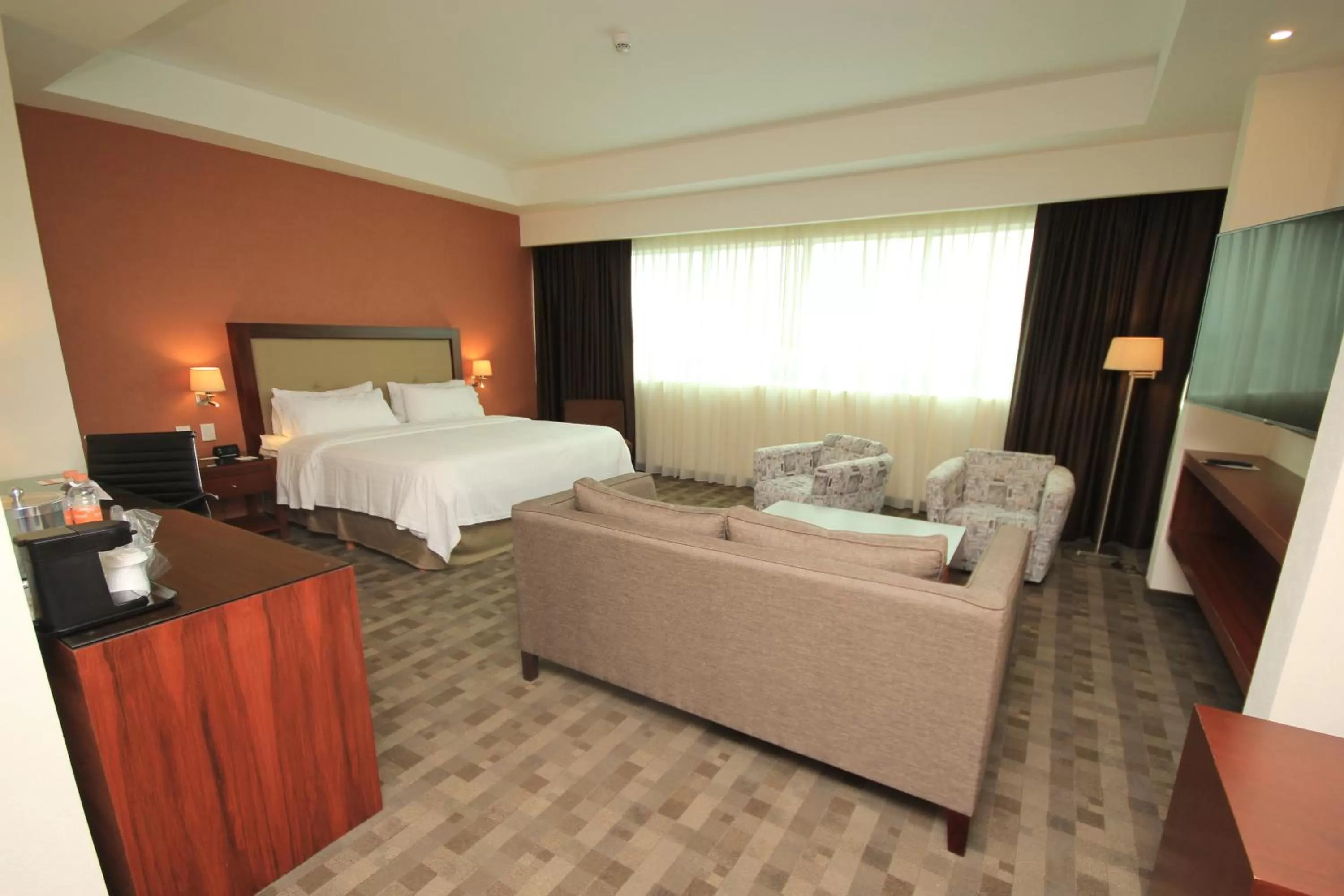 Photo of the whole room, Bed in Holiday Inn & Suites Plaza Mayor by IHG